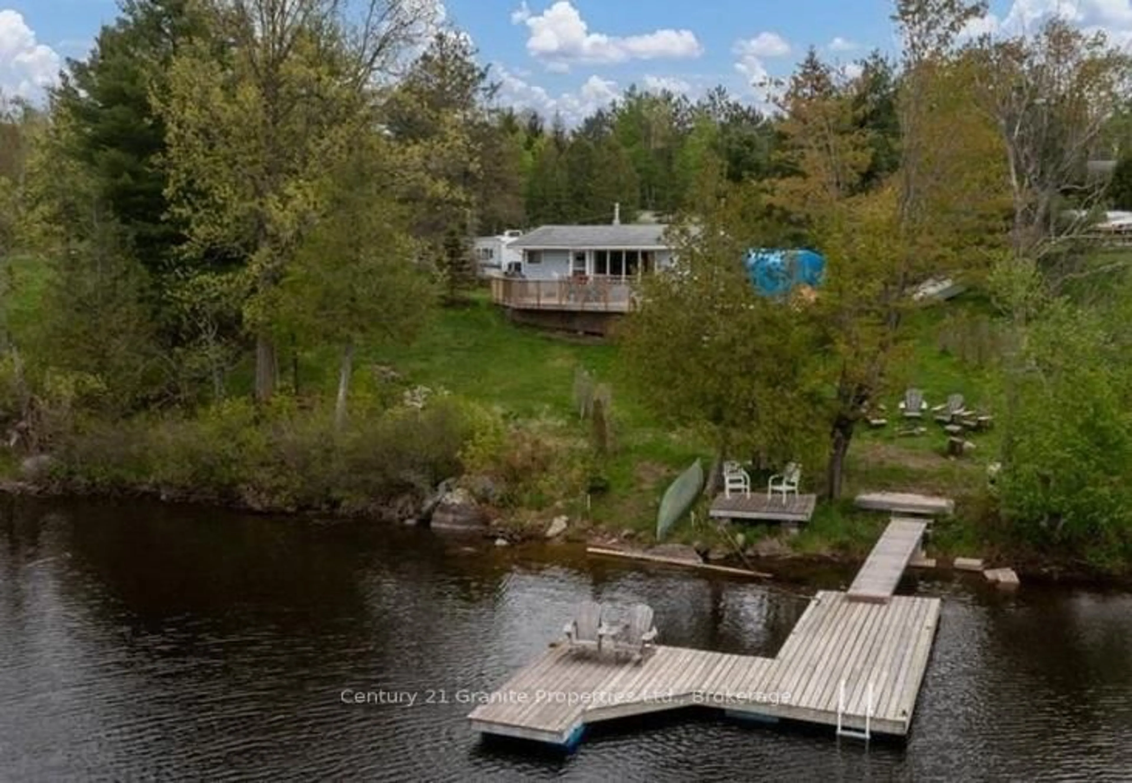 A pic from outside/outdoor area/front of a property/back of a property/a pic from drone, water/lake/river/ocean view for 9 Martha Dr, McKellar Ontario P0G 1C0