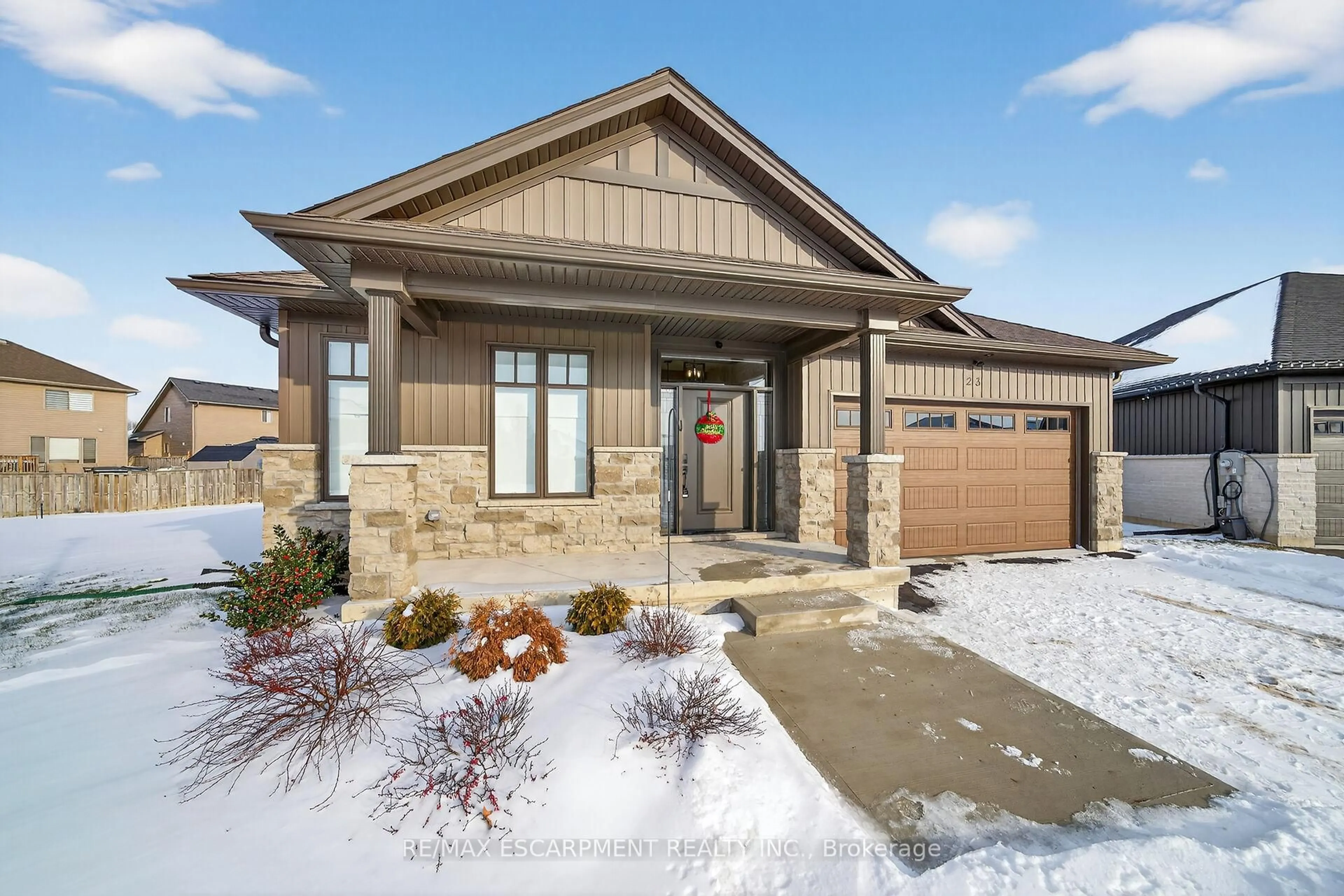 Home with brick exterior material, street for 24 CRADDOCK Blvd #23, Haldimand Ontario N0A 1J0