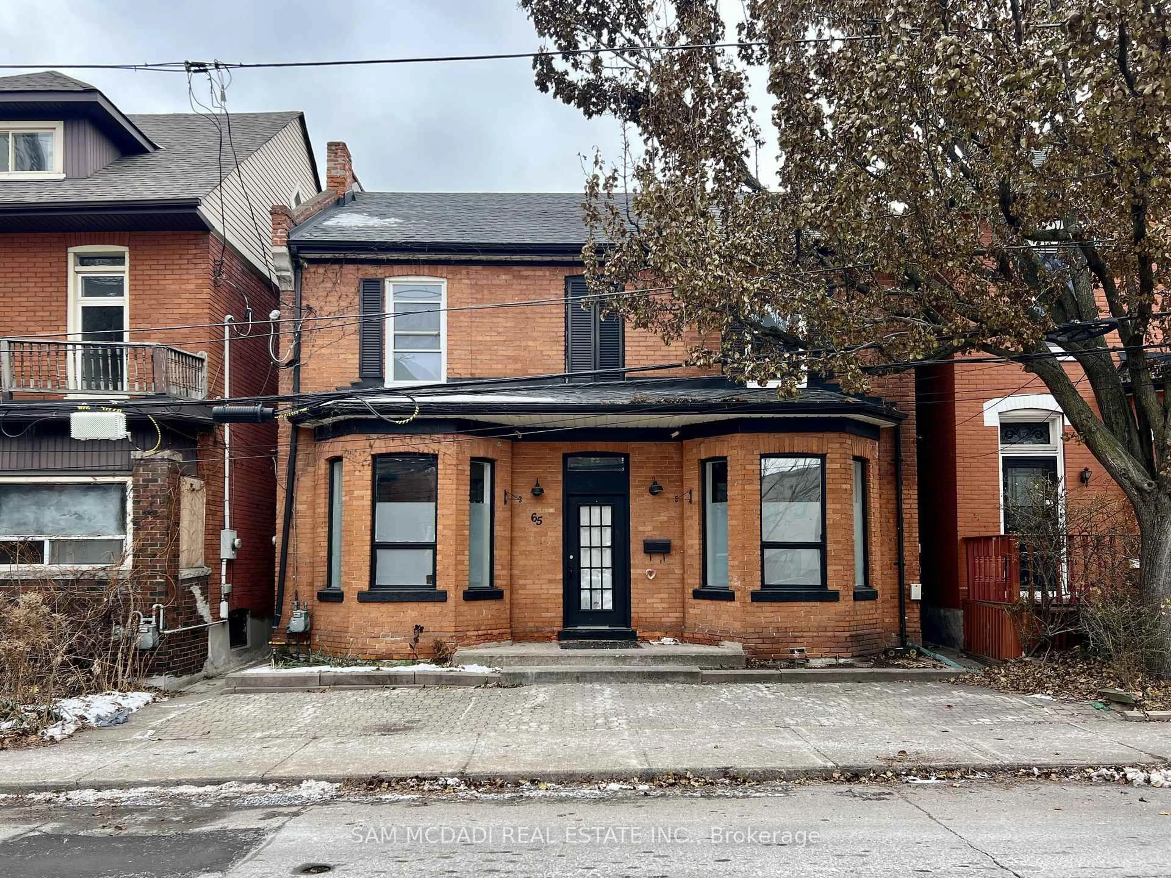 Home with brick exterior material, street for 65 Walnut St, Hamilton Ontario L8N 2L2