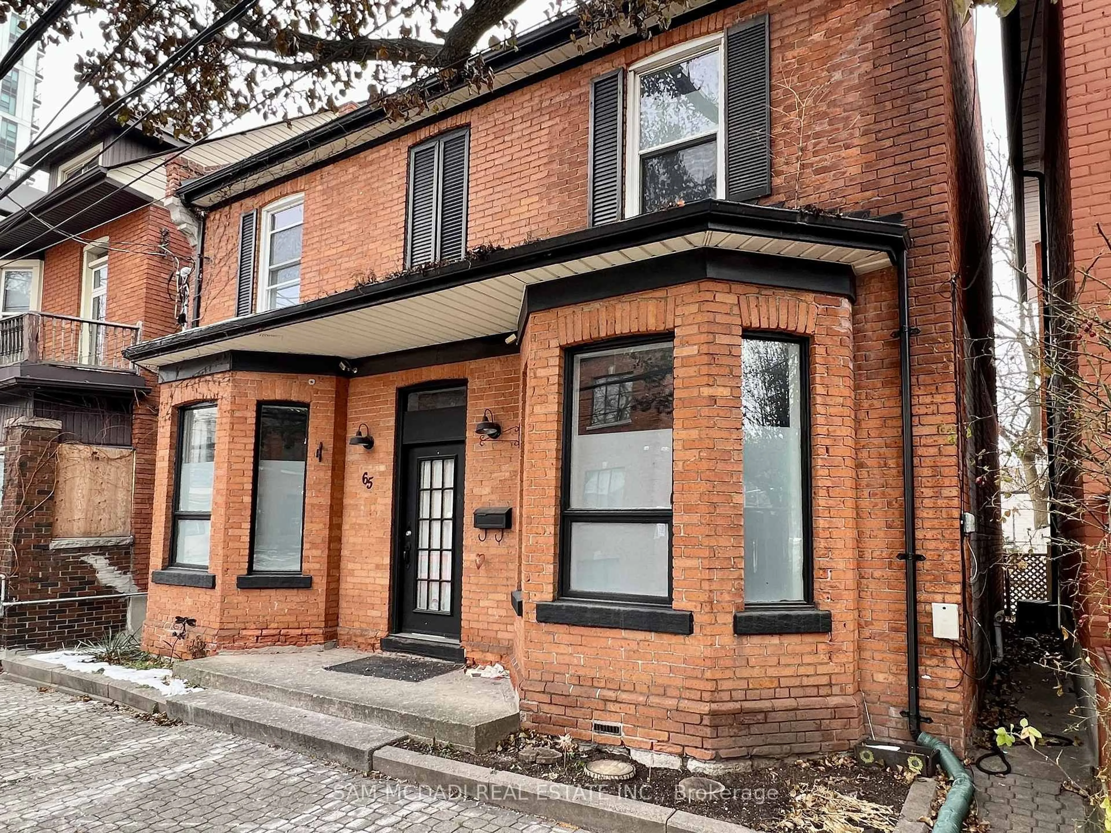 Home with brick exterior material, street for 65 Walnut St, Hamilton Ontario L8N 2L2