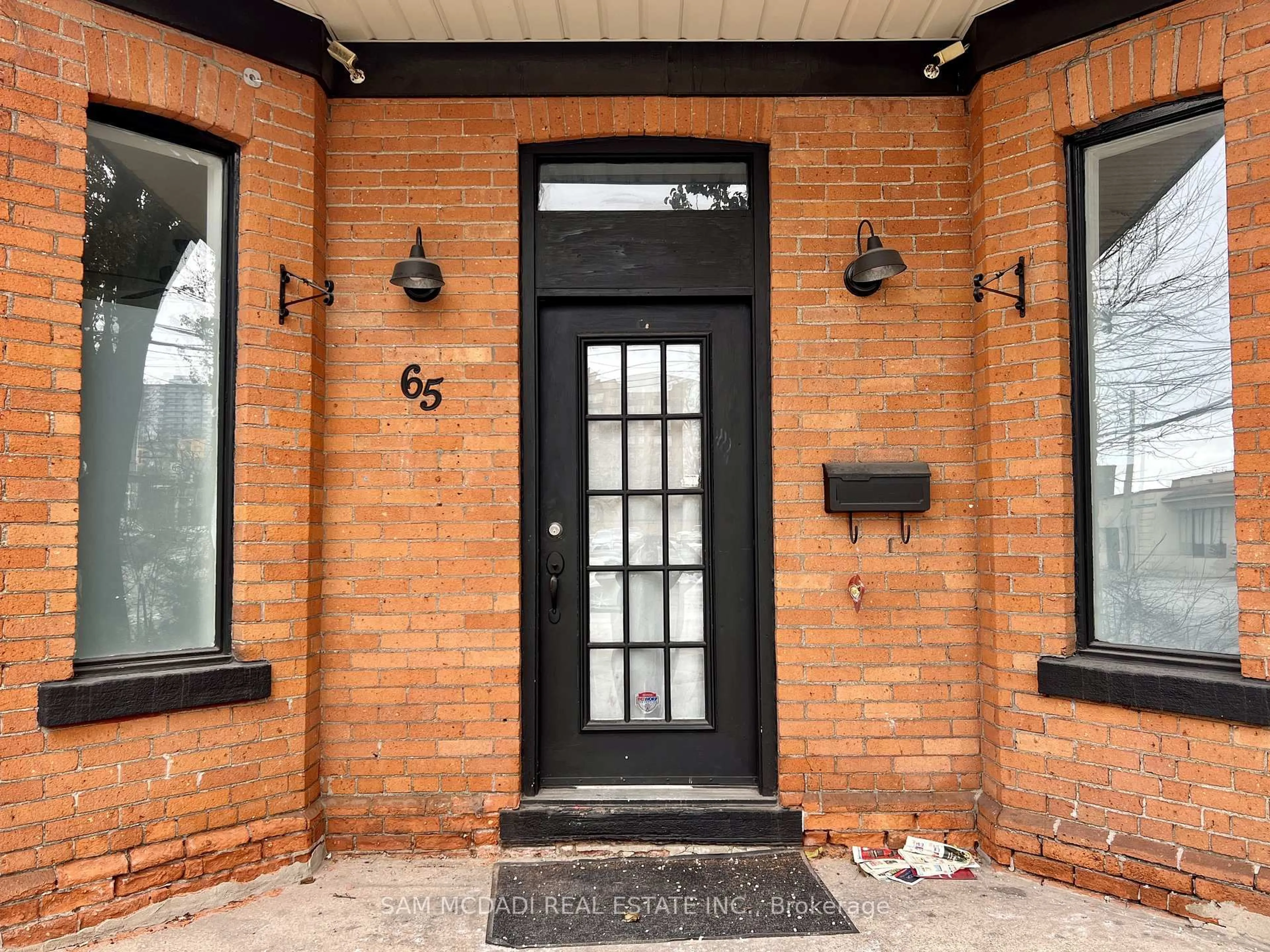 Home with brick exterior material, street for 65 Walnut St, Hamilton Ontario L8N 2L2