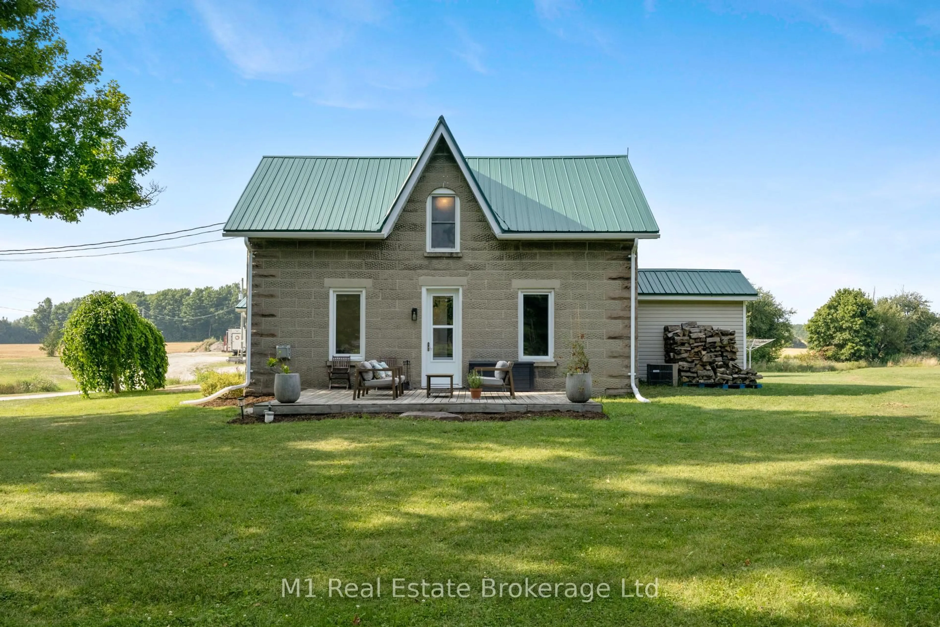 A pic from outside/outdoor area/front of a property/back of a property/a pic from drone, water/lake/river/ocean view for 8420 Sixth Line, Wellington North Ontario N0G 2E0