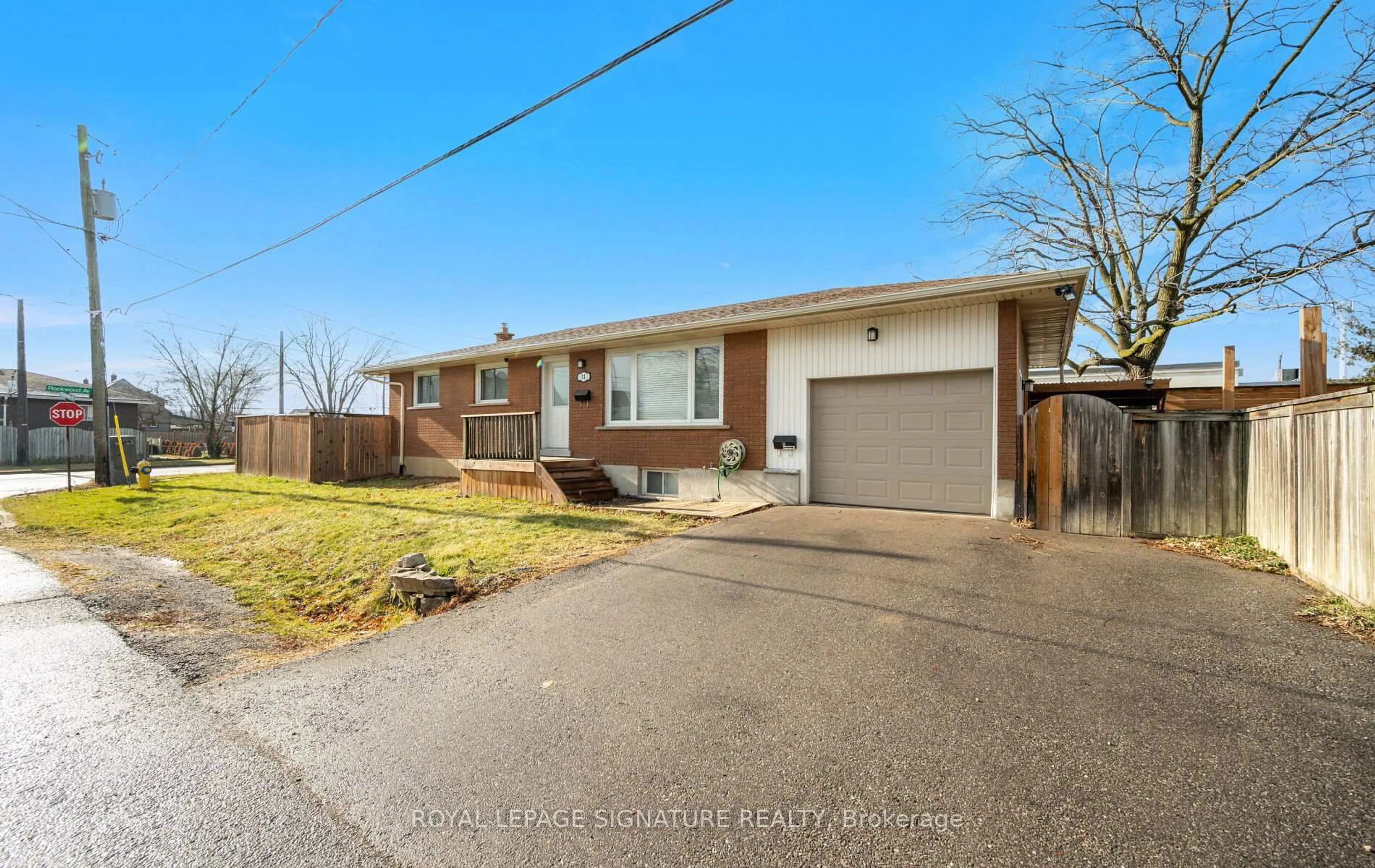 Home with brick exterior material, street for 11 Rockwood Ave, St. Catharines Ontario L2P 1E3