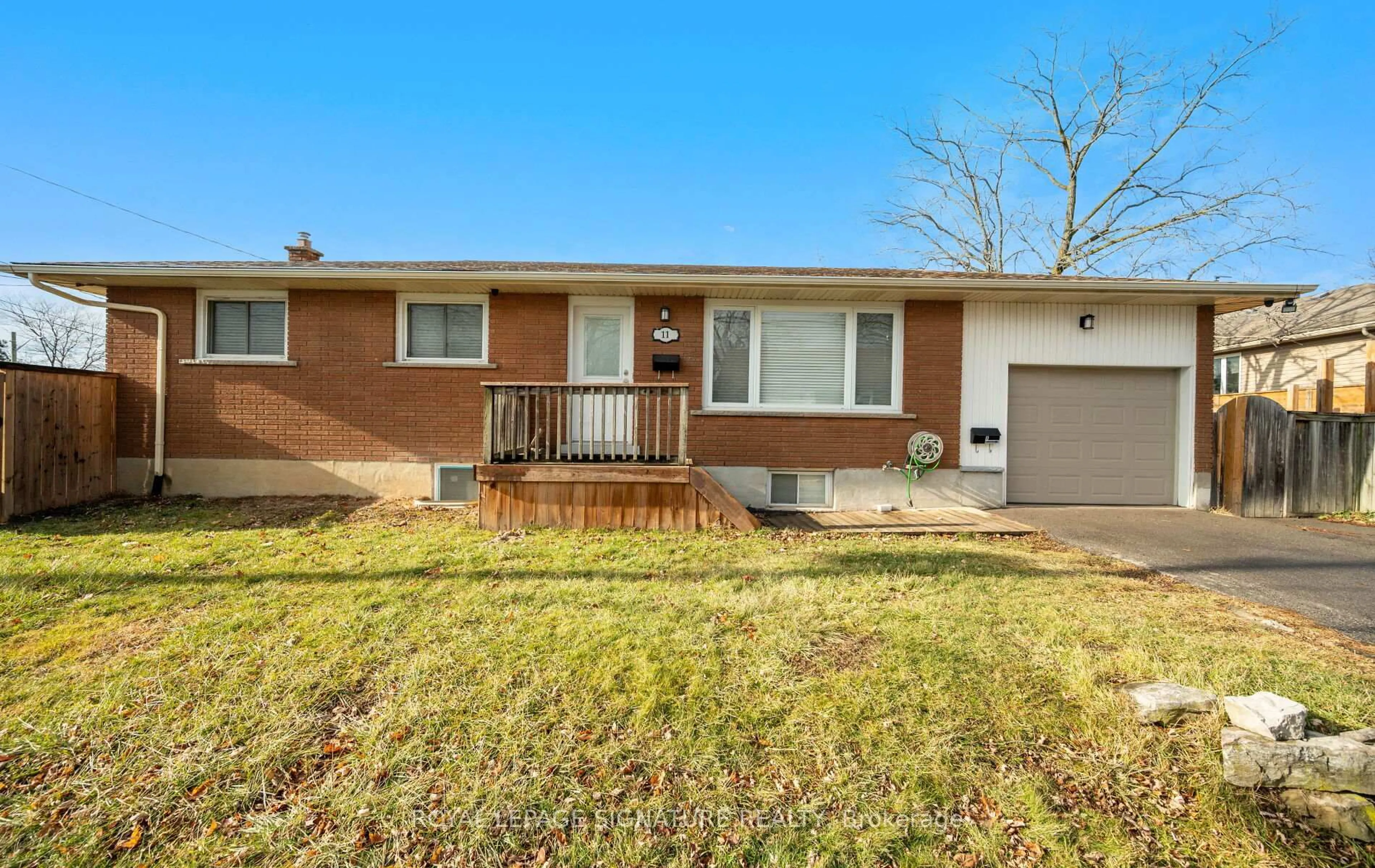 Home with brick exterior material, street for 11 Rockwood Ave, St. Catharines Ontario L2P 1E3