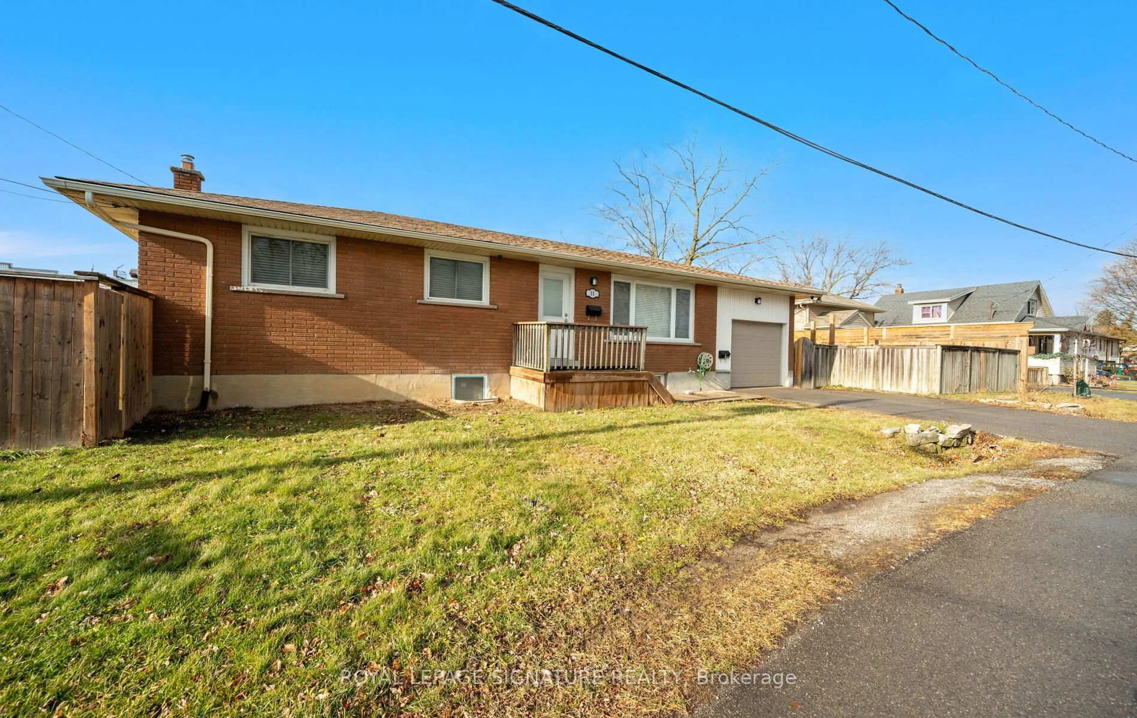 Home with brick exterior material, street for 11 Rockwood Ave, St. Catharines Ontario L2P 1E3