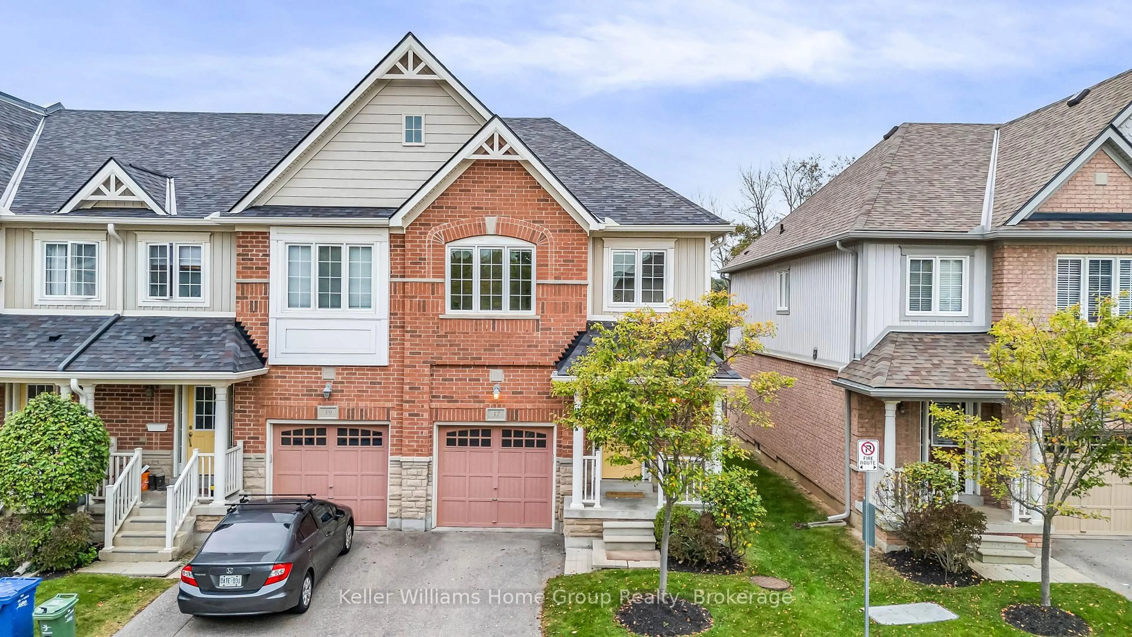 Home with brick exterior material, street for 1035 Victoria Rd ##37, Guelph Ontario N1L 0H5