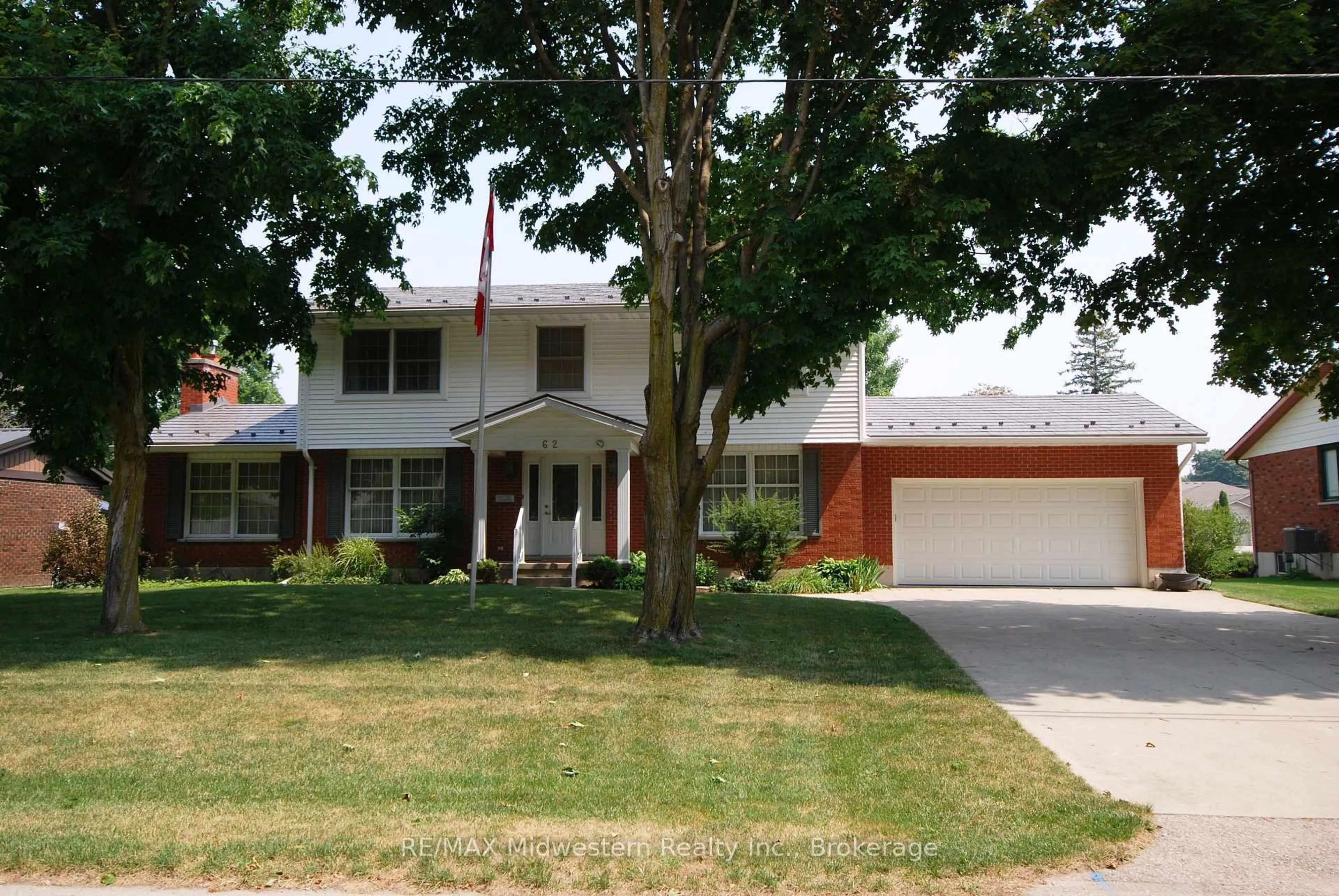 Home with vinyl exterior material, street for 62 King St, Minto Ontario N0G 1Z0