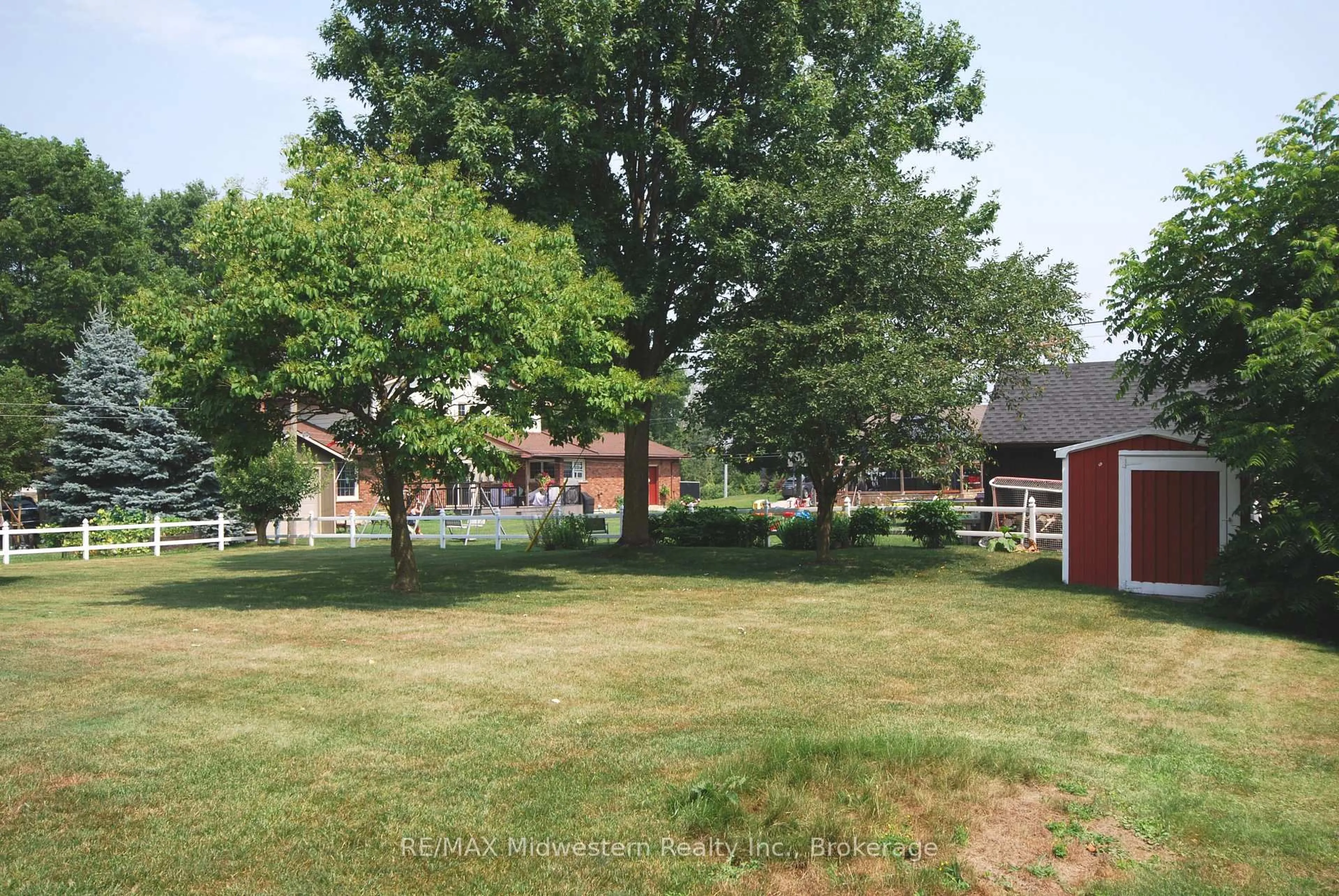 A pic from outside/outdoor area/front of a property/back of a property/a pic from drone, street for 62 King St, Minto Ontario N0G 1Z0