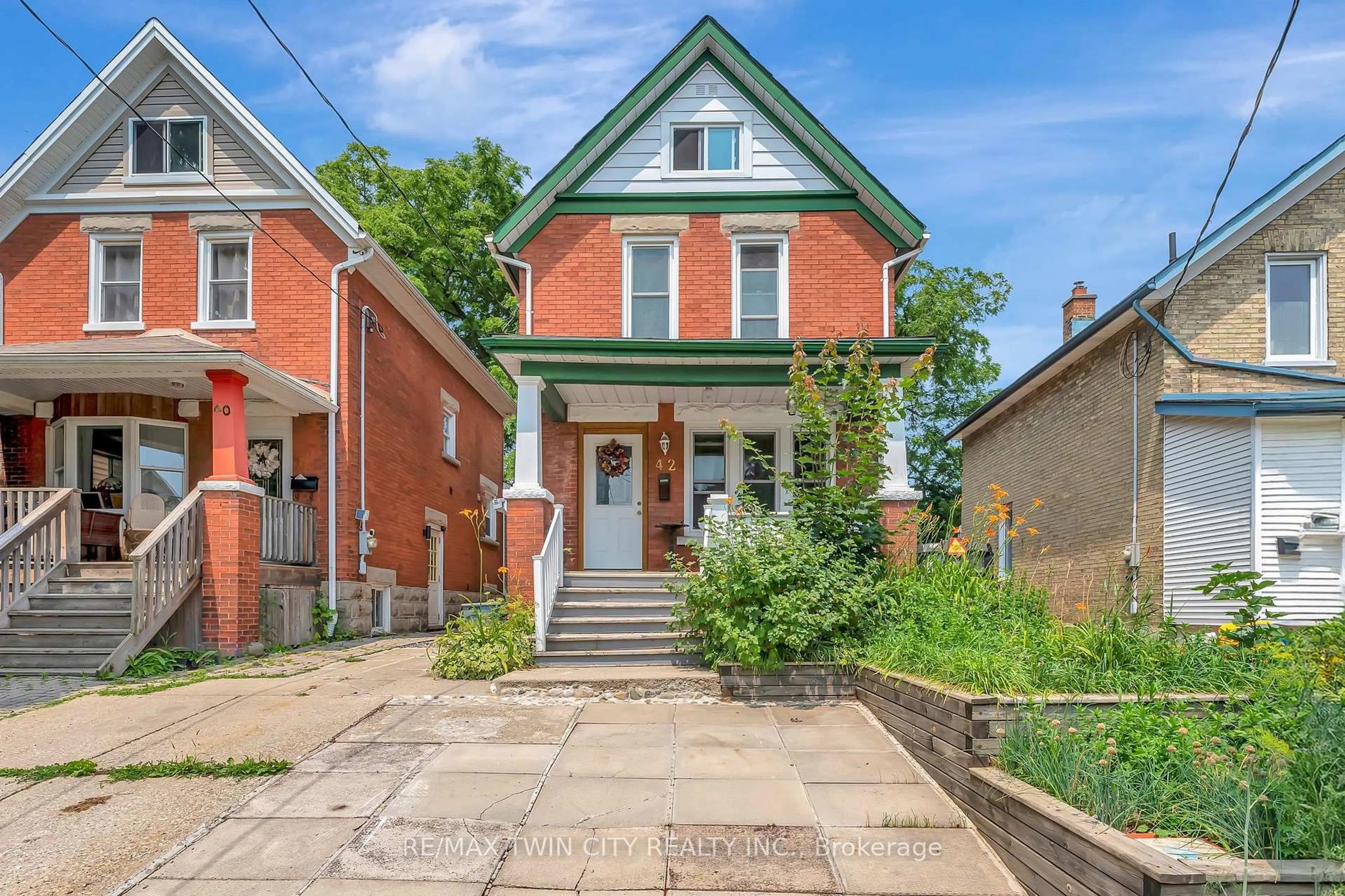 Home with brick exterior material, street for 42 Shanley St, Waterloo Ontario N2H 4N9