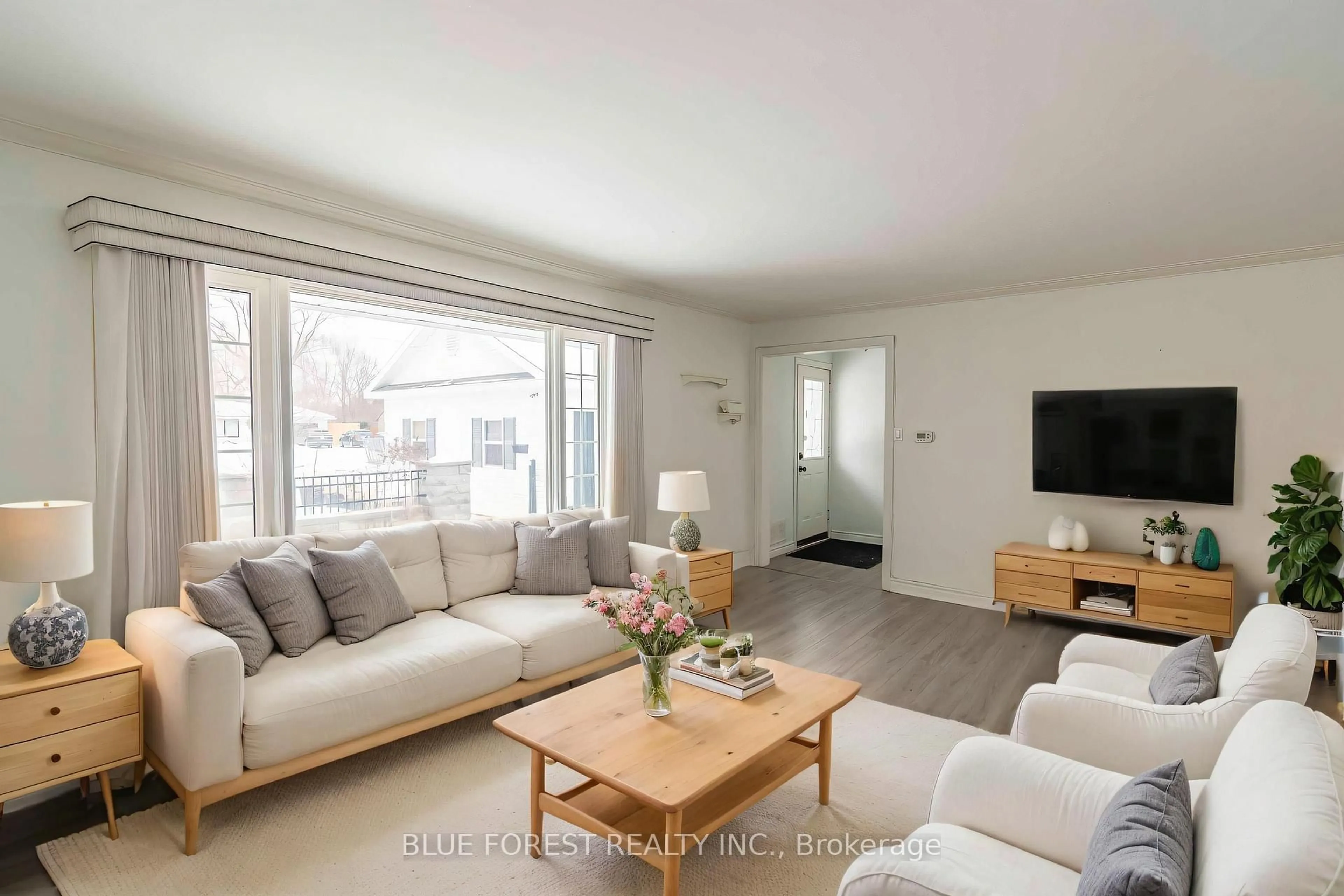 Living room with furniture, wood/laminate floor for 24 Daleview Cres, London North Ontario N5X 1H1