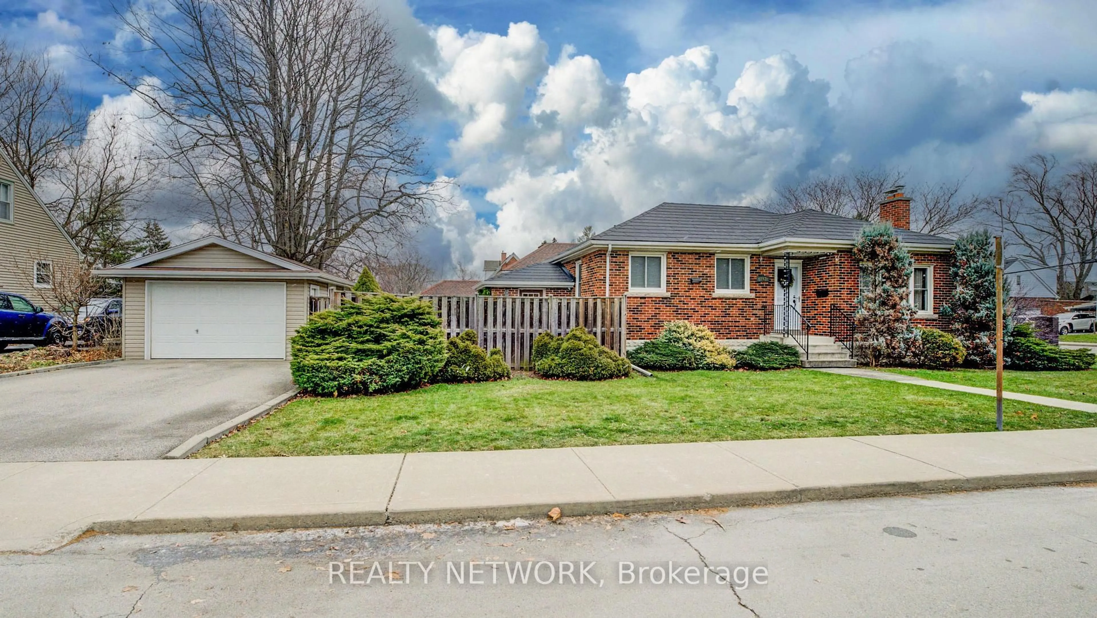 Home with brick exterior material, street for 143 Rosedale Ave, Hamilton Ontario L8K 4N3