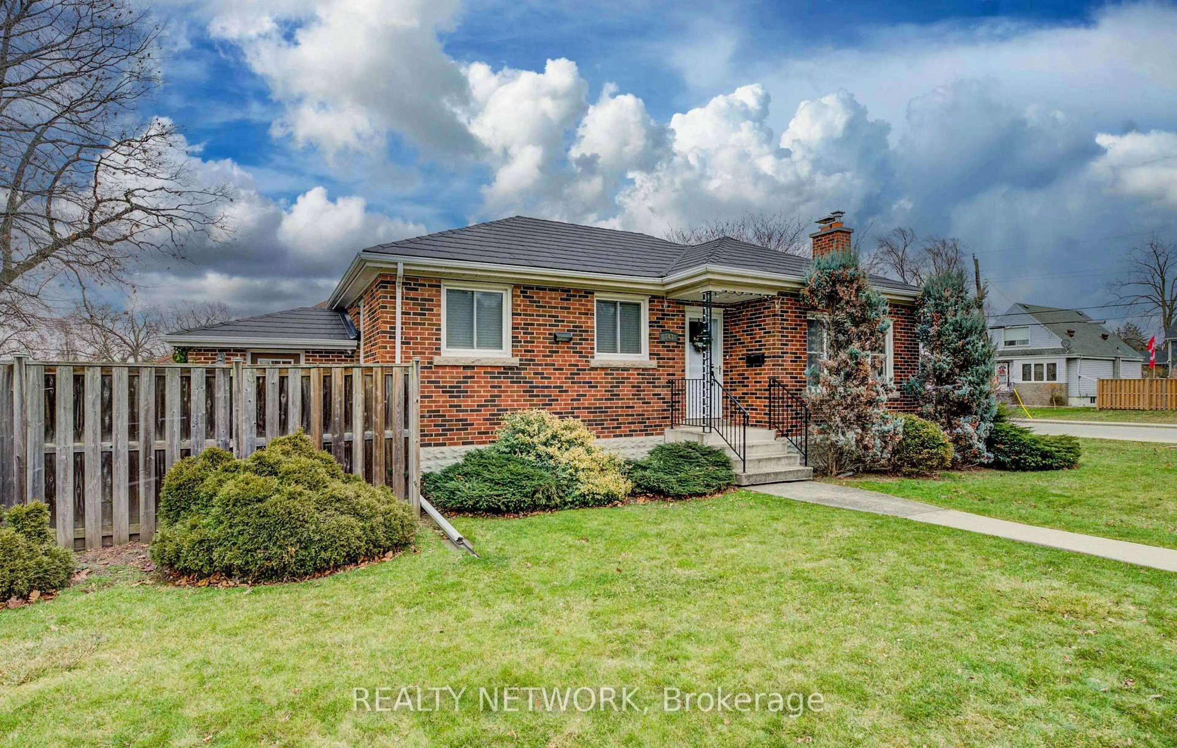Home with brick exterior material, street for 143 Rosedale Ave, Hamilton Ontario L8K 4N3