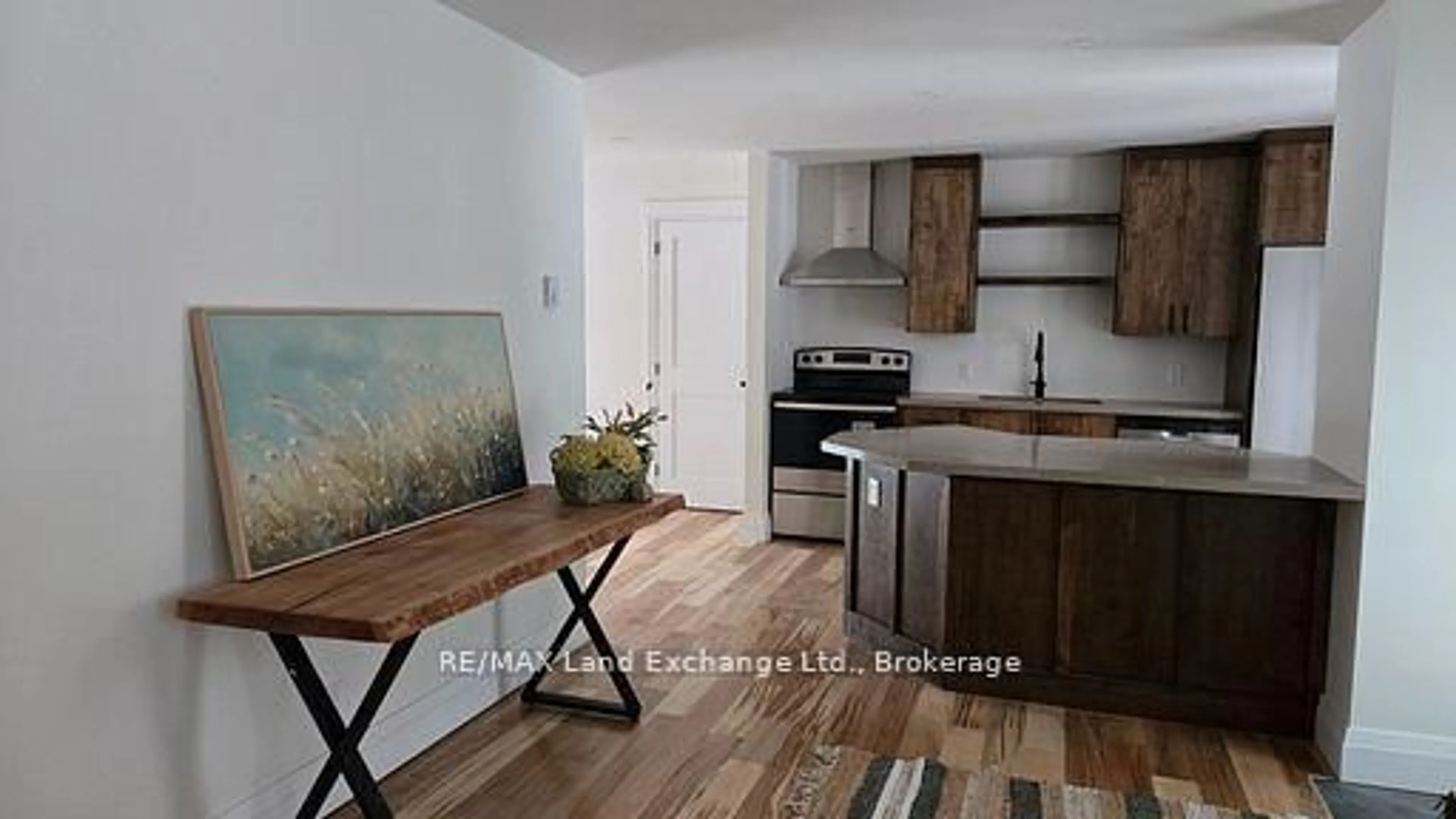 Open concept kitchen, wood/laminate floor for 325 Ojibwa Tr, Huron-Kinloss Ontario N0G 2R0