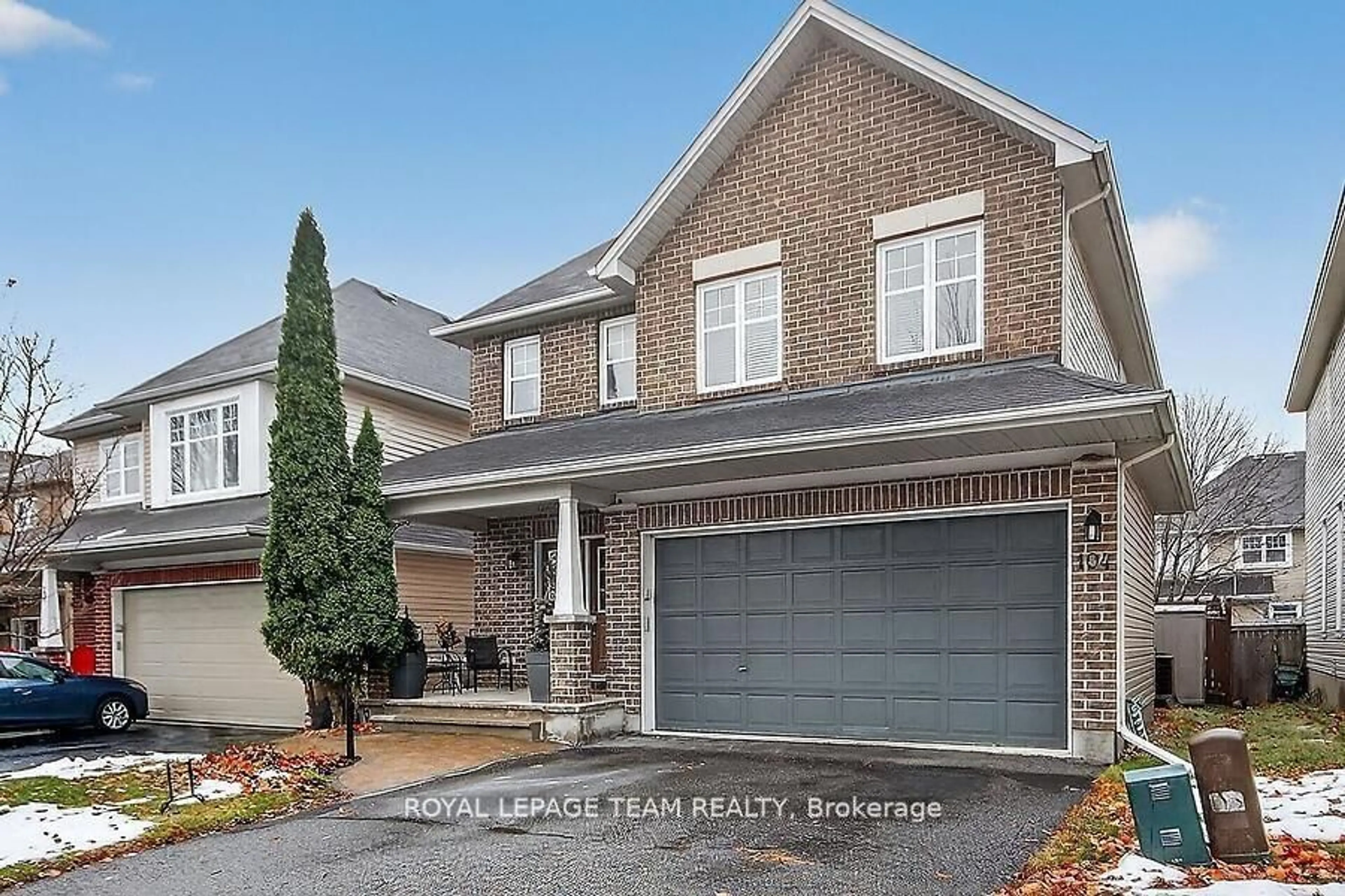 Home with brick exterior material, street for 104 Versilia Dr, Ottawa Ontario K2G 7E4