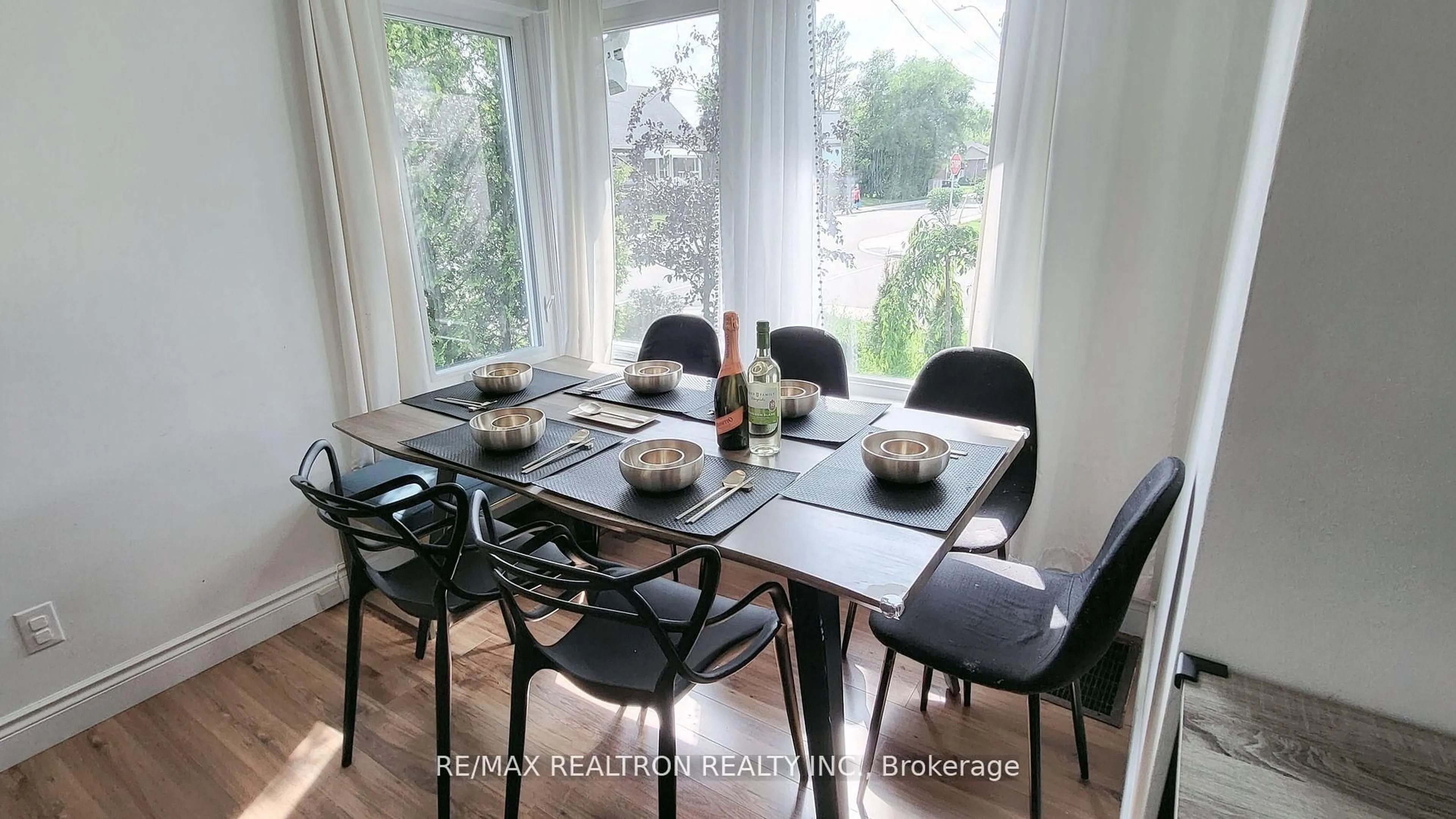 Dining room, wood/laminate floor for 15 West 1st St, Hamilton Ontario L9C 3B5
