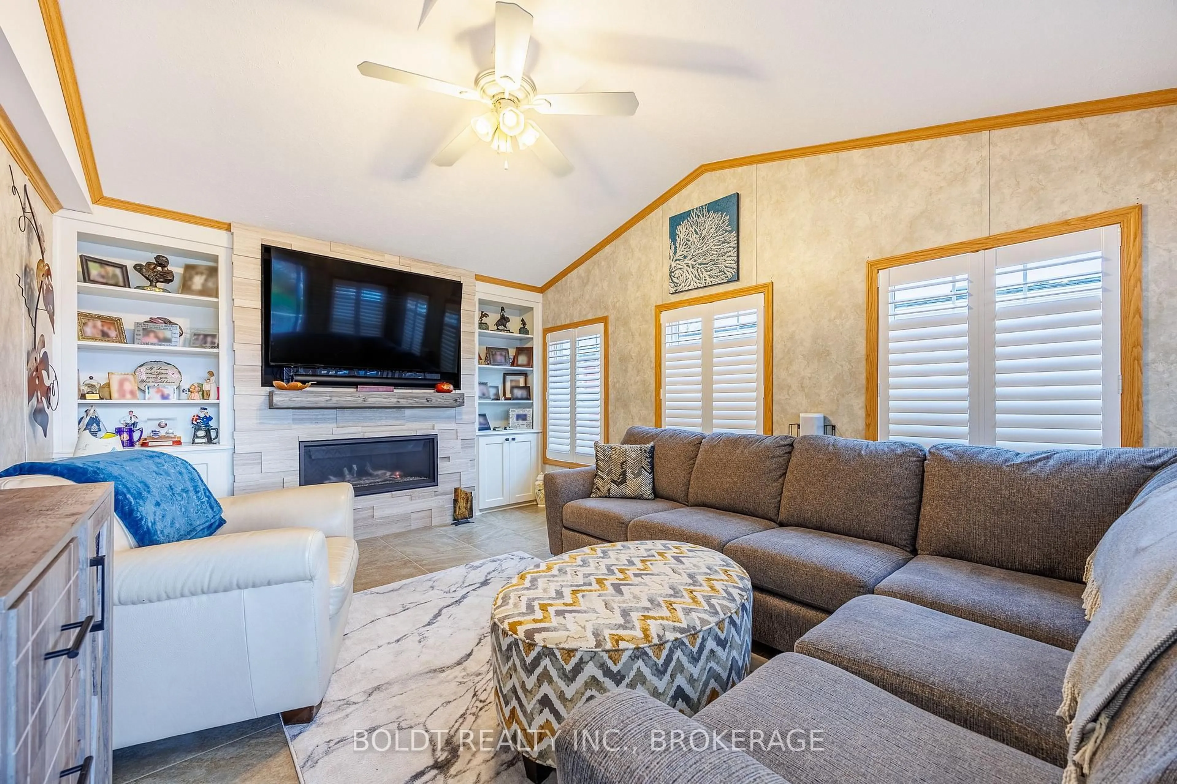 Living room with furniture, ceramic/tile floor for 3033 Townline Rd #101, Fort Erie Ontario L0S 1S1