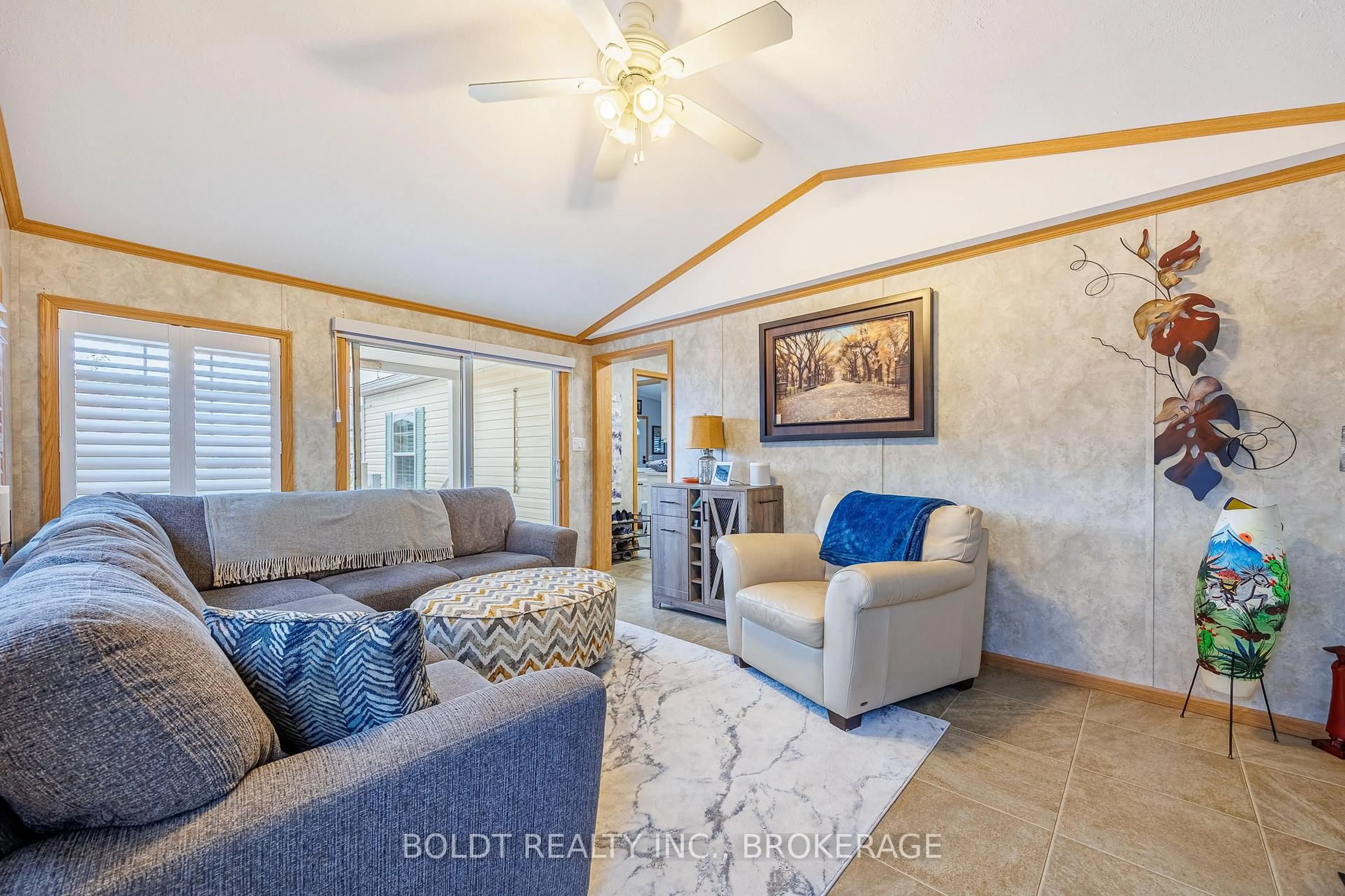 Living room with furniture, ceramic/tile floor for 3033 Townline Rd #101, Fort Erie Ontario L0S 1S1