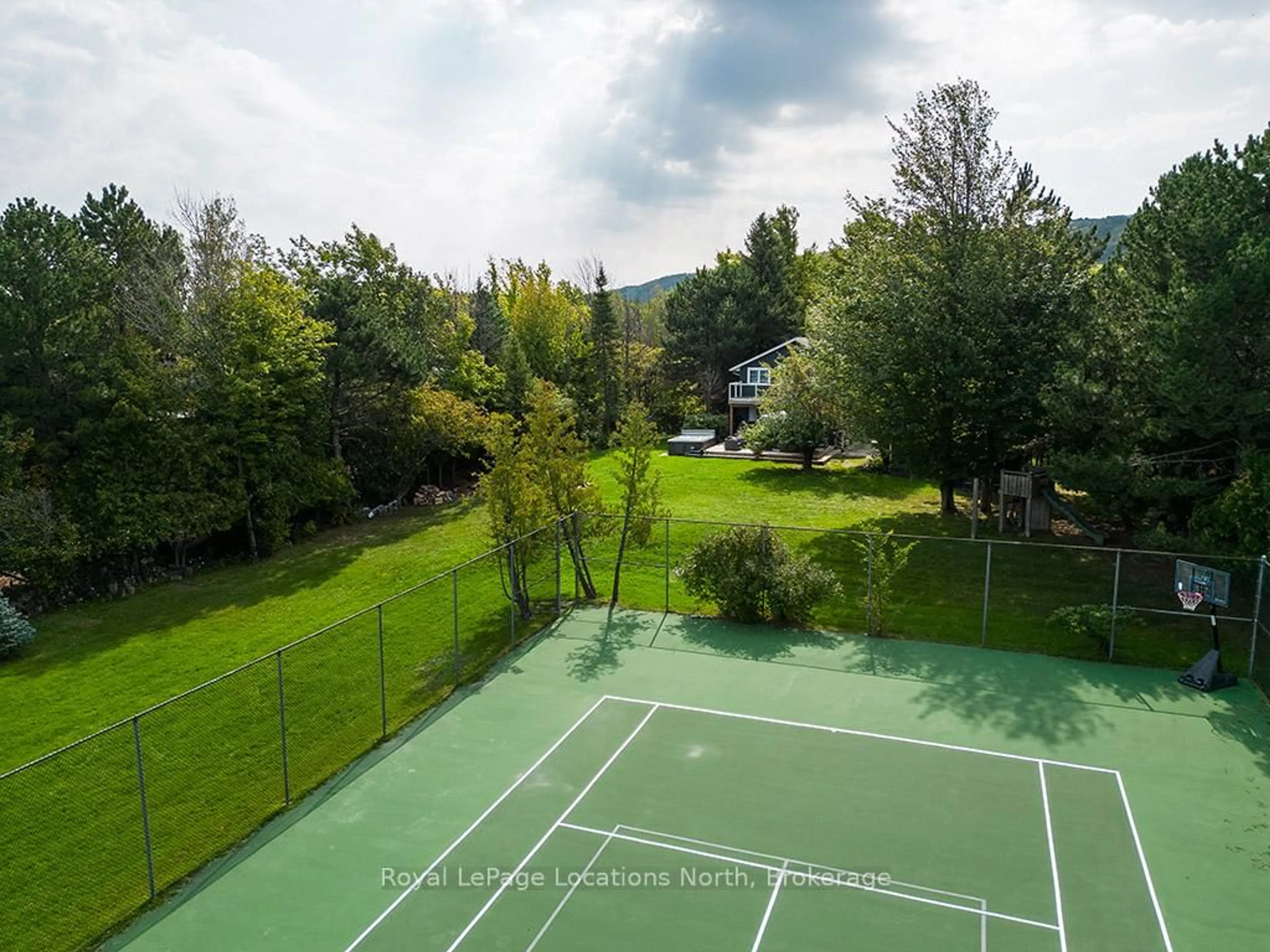 A pic from outside/outdoor area/front of a property/back of a property/a pic from drone, forest/trees view for 107 Margaret Dr, Blue Mountains Ontario L9Y 0T5