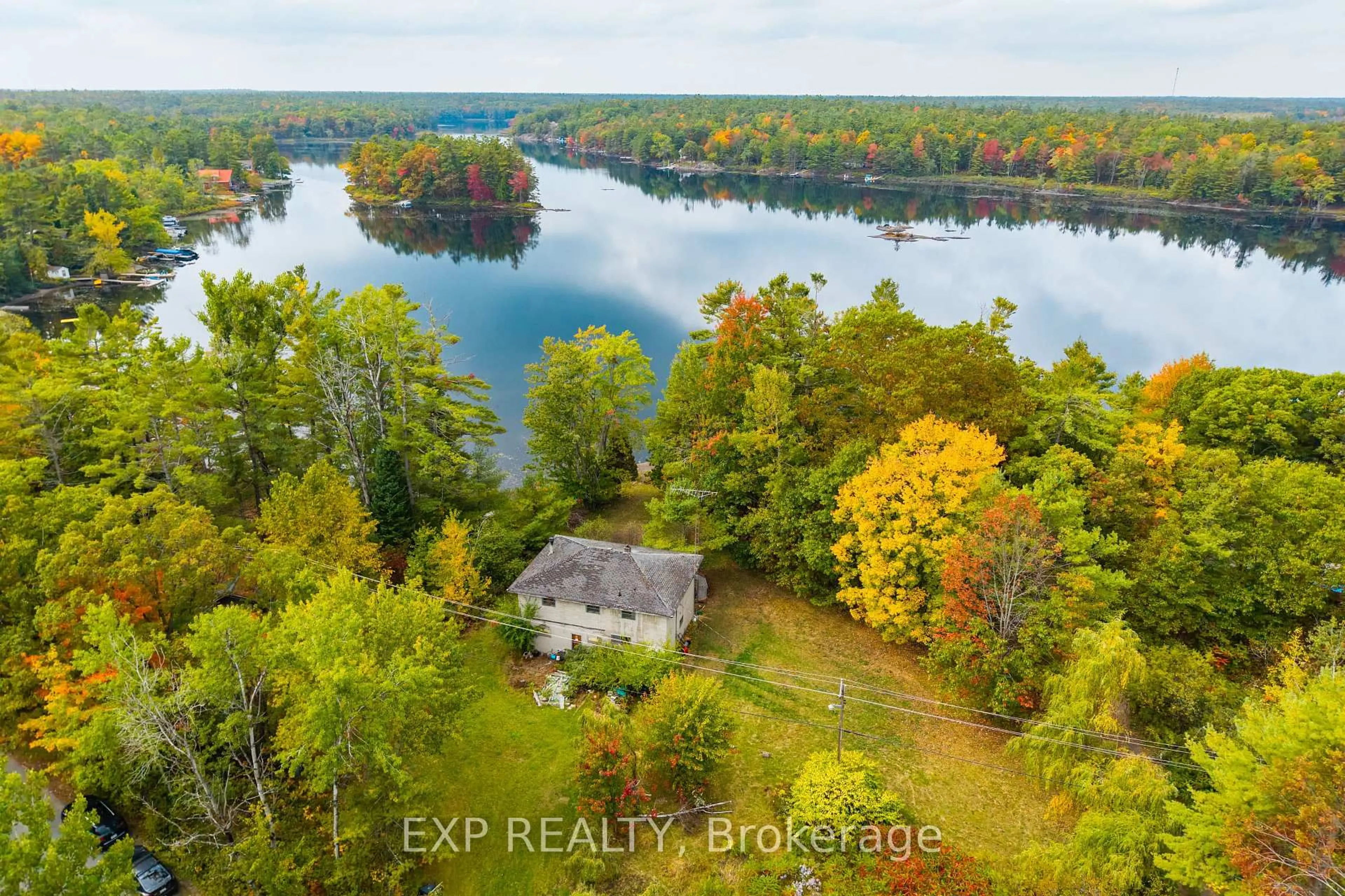 A pic from outside/outdoor area/front of a property/back of a property/a pic from drone, water/lake/river/ocean view for 1144 South Morrison Lake Rd, Gravenhurst Ontario P0E 1G0
