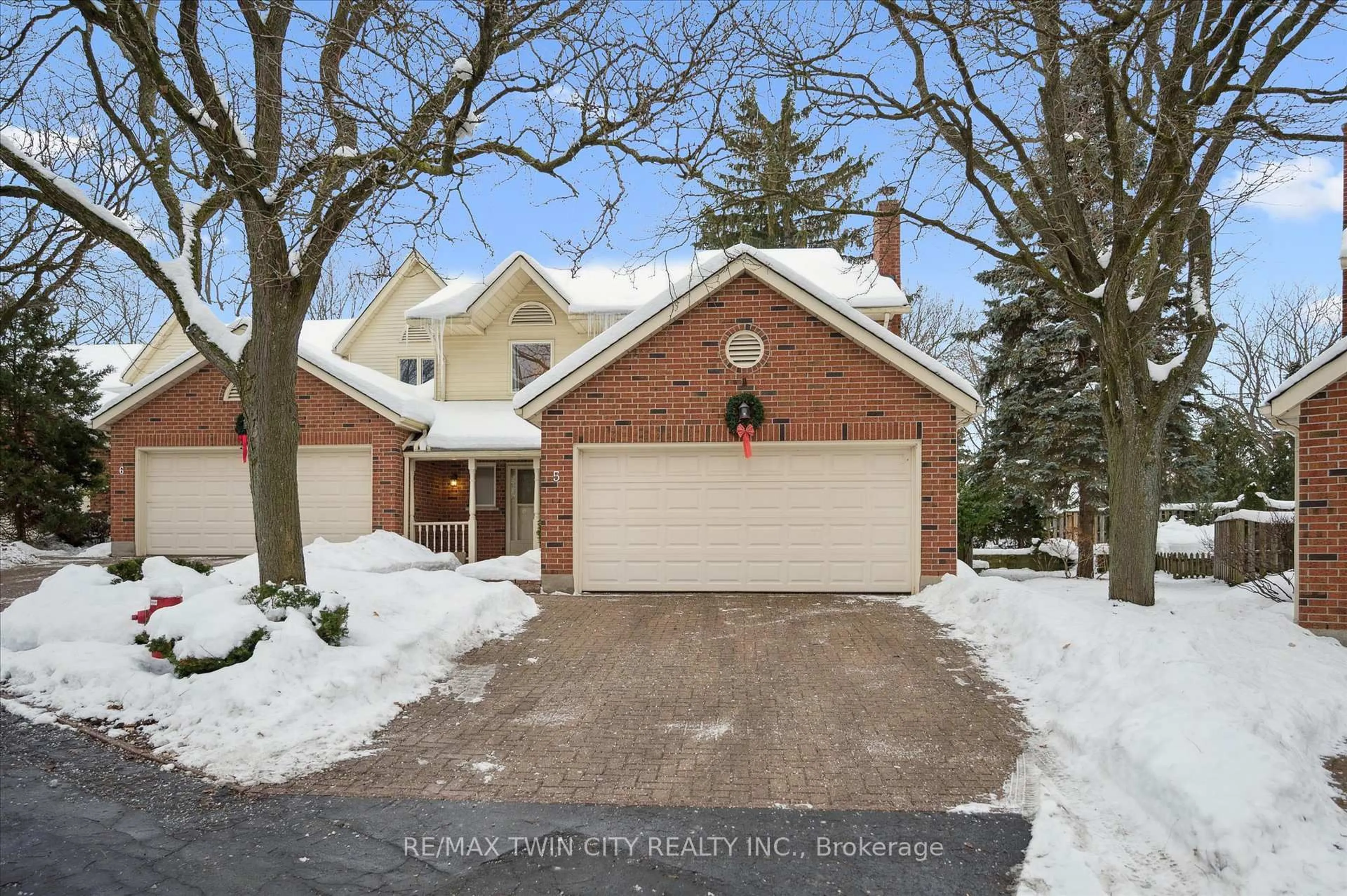 Home with brick exterior material, street for 405 Glasgow St #5, Waterloo Ontario N2M 2N1