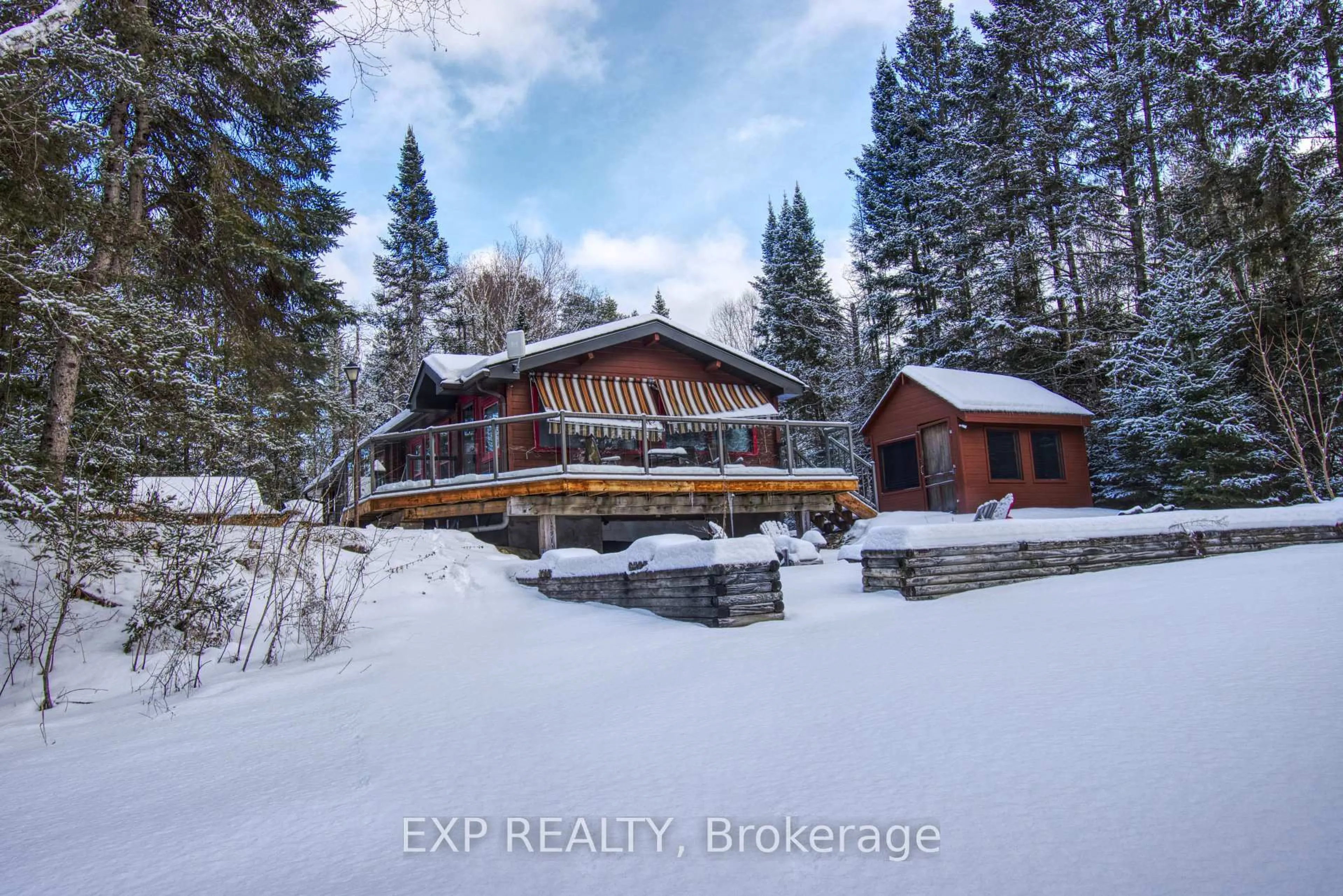 A pic from outside/outdoor area/front of a property/back of a property/a pic from drone, unknown for 27 Groeger Rd, Huntsville Ontario P1H 2J4