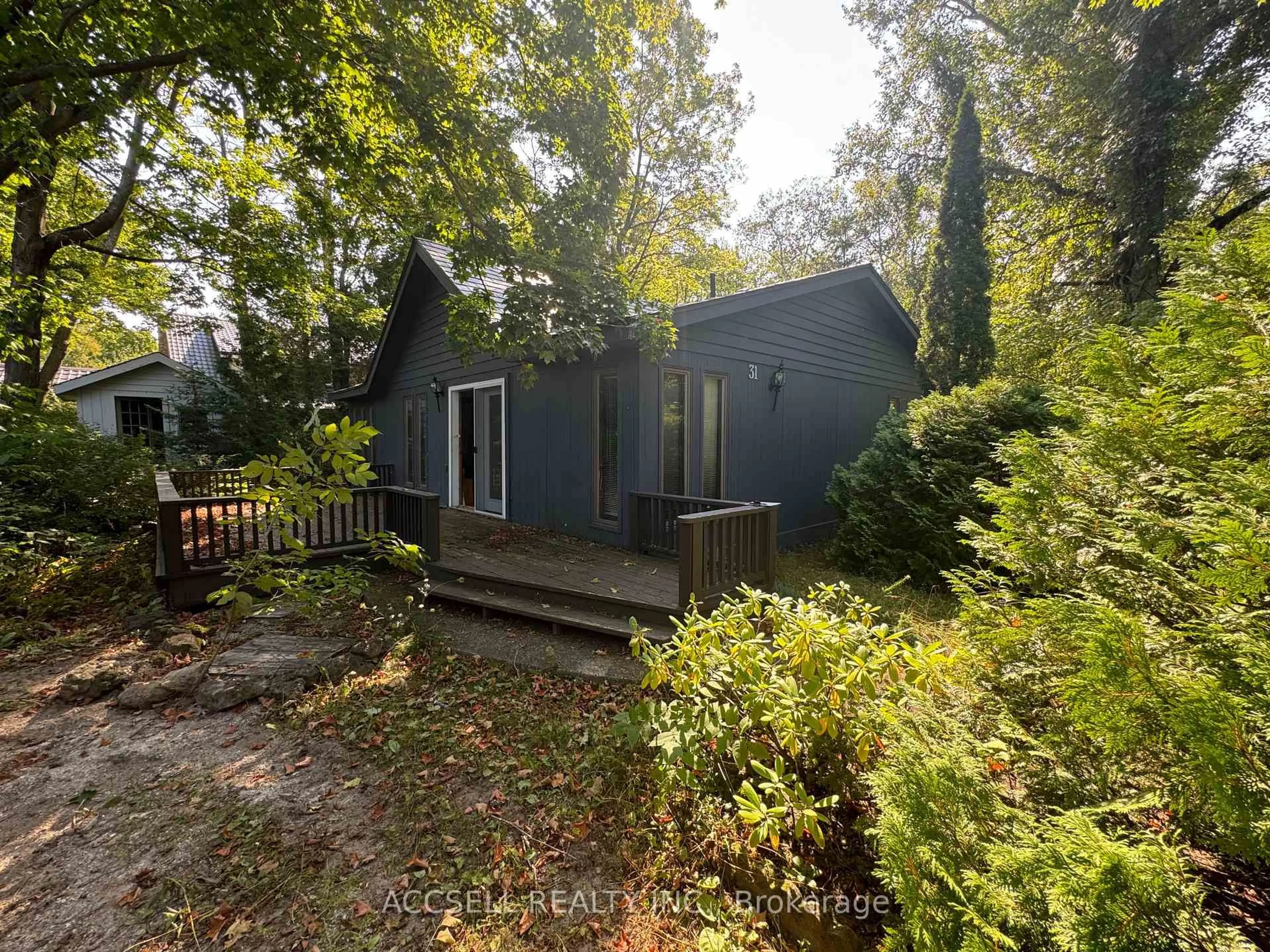 A pic from outside/outdoor area/front of a property/back of a property/a pic from drone, forest/trees view for 31 Barrie Ave, South Bruce Peninsula Ontario N0H 2G0