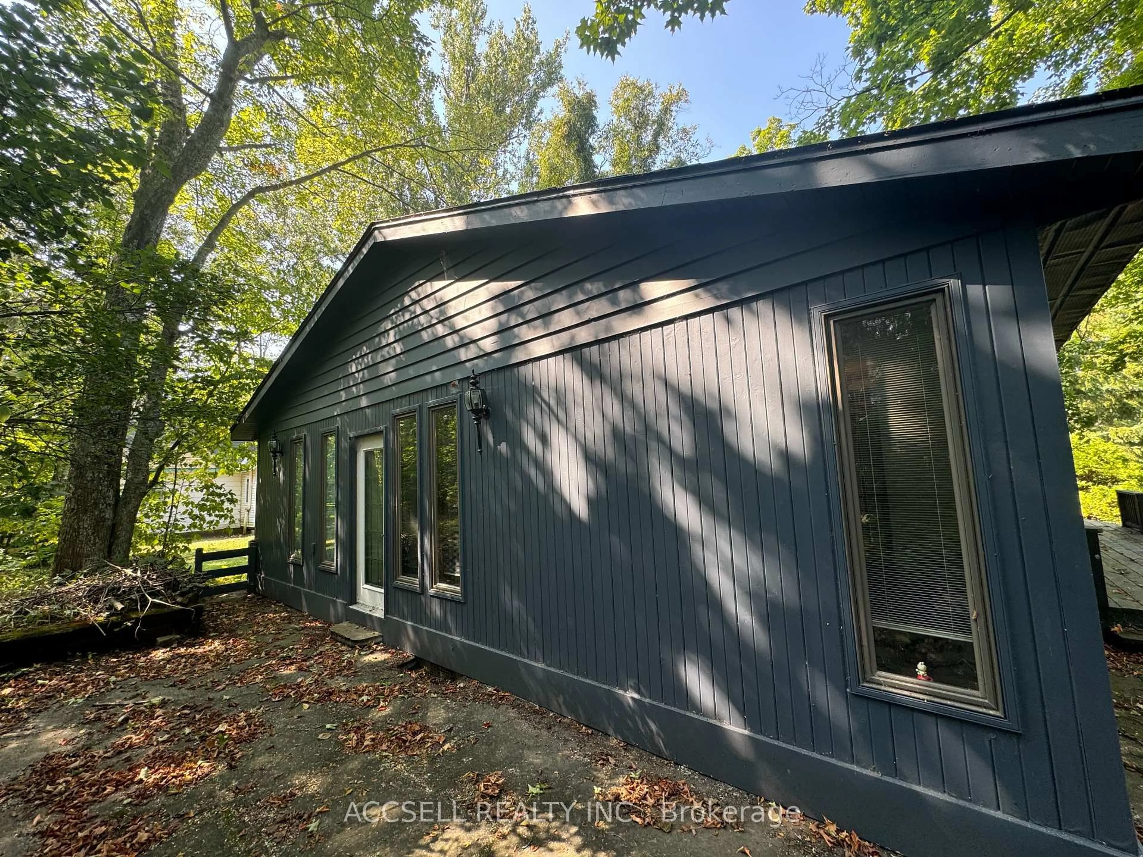 Home with vinyl exterior material, forest/trees view for 31 Barrie Ave, South Bruce Peninsula Ontario N0H 2G0