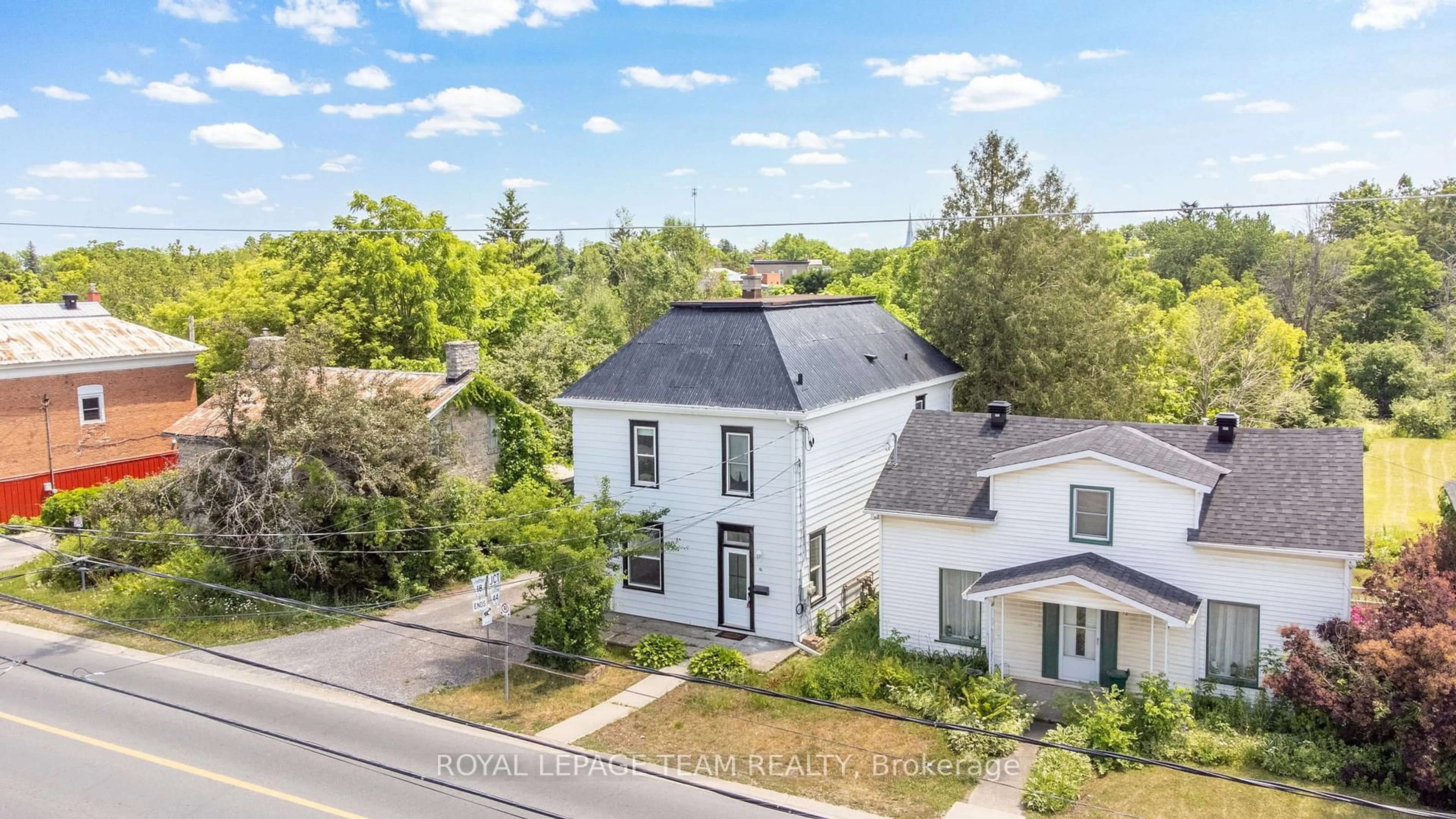 A pic from outside/outdoor area/front of a property/back of a property/a pic from drone, street for 14-16 Clothier St, North Grenville Ontario L3Z 3E6