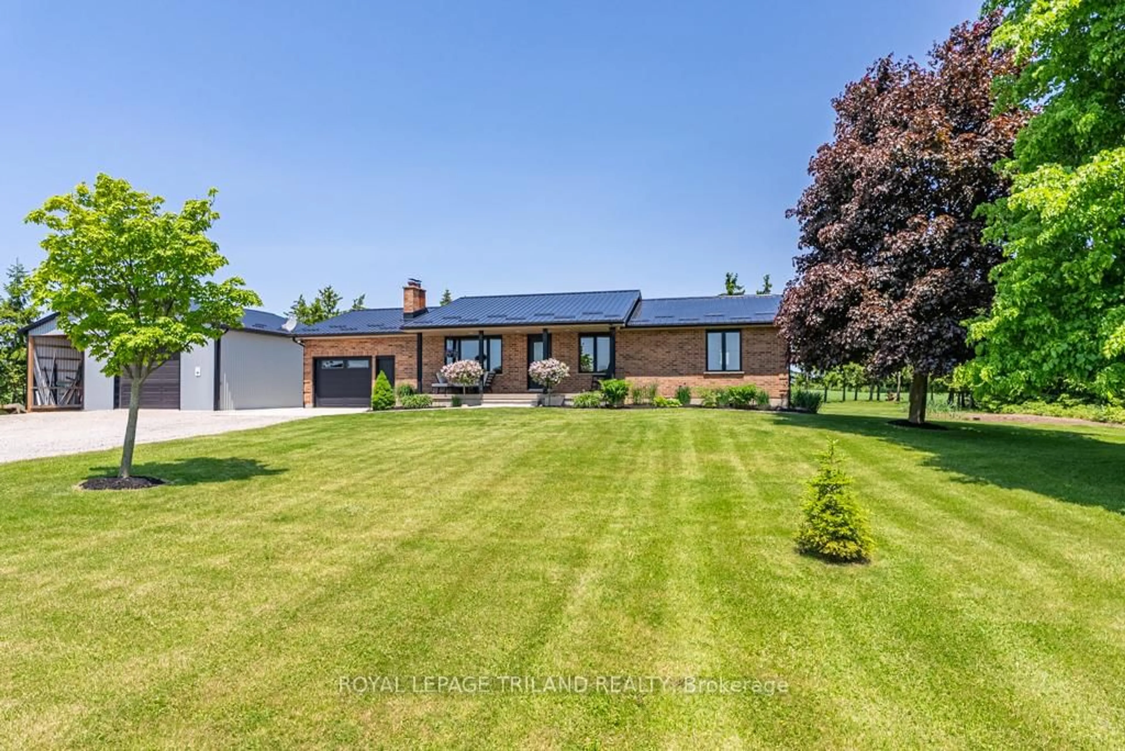 A pic from outside/outdoor area/front of a property/back of a property/a pic from drone, street for 42420 Ron Mcneil Line, Central Elgin Ontario N5P 3T1