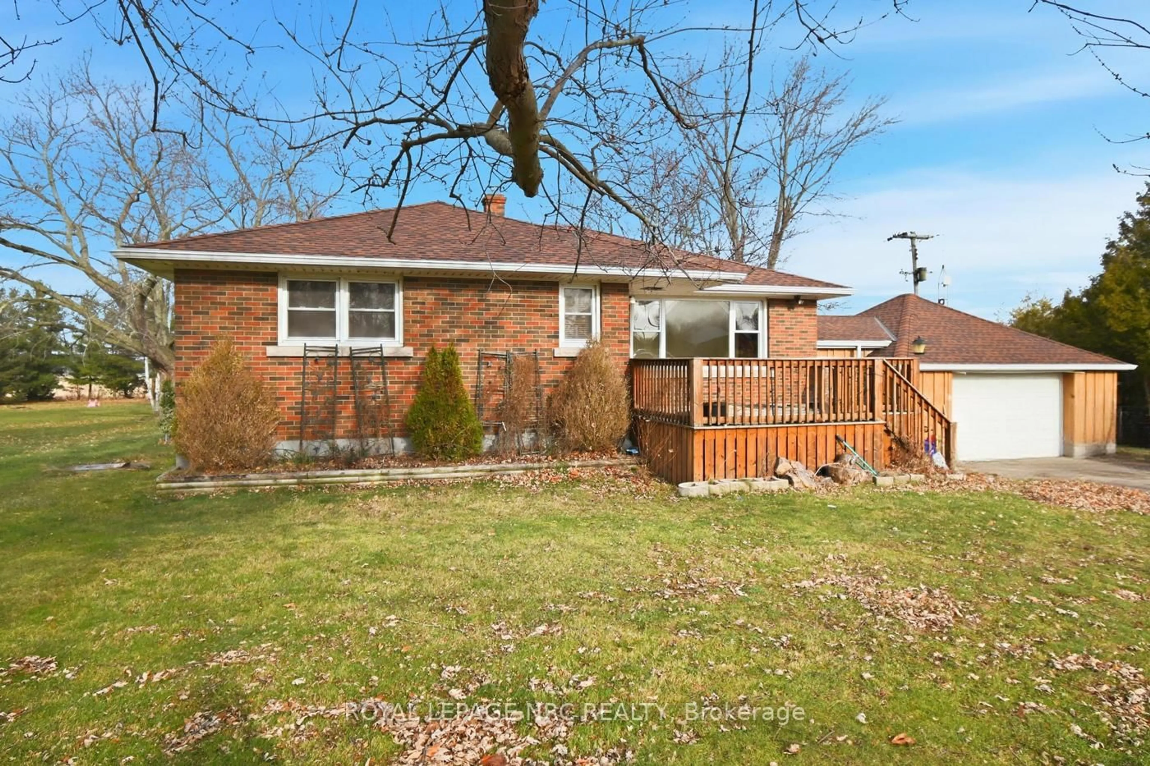 Home with brick exterior material, street for 11572 Hwy 3 Highway, Wainfleet Ontario L0S 1V0