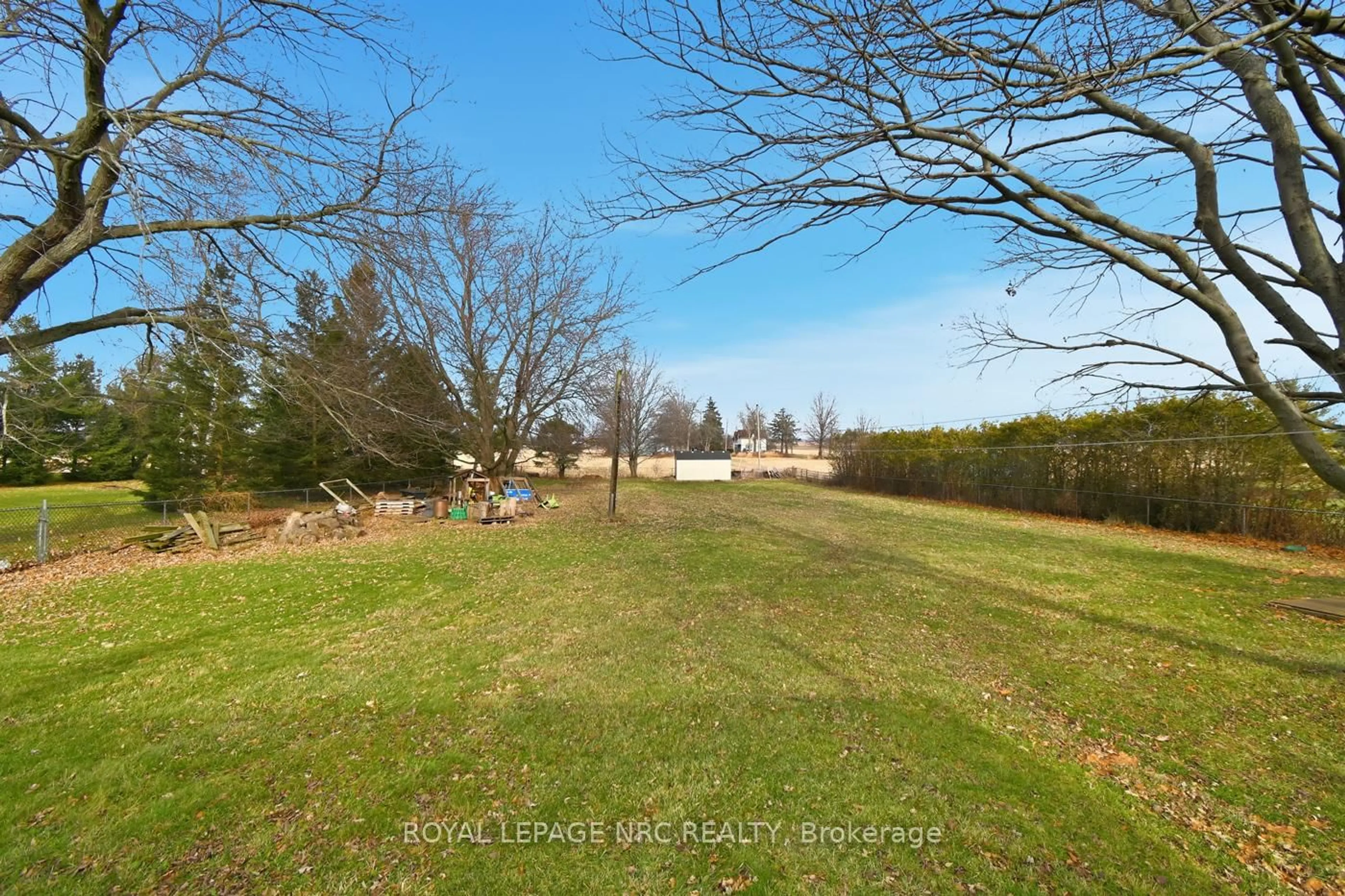 A pic from outside/outdoor area/front of a property/back of a property/a pic from drone, forest/trees view for 11572 Hwy 3 Highway, Wainfleet Ontario L0S 1V0
