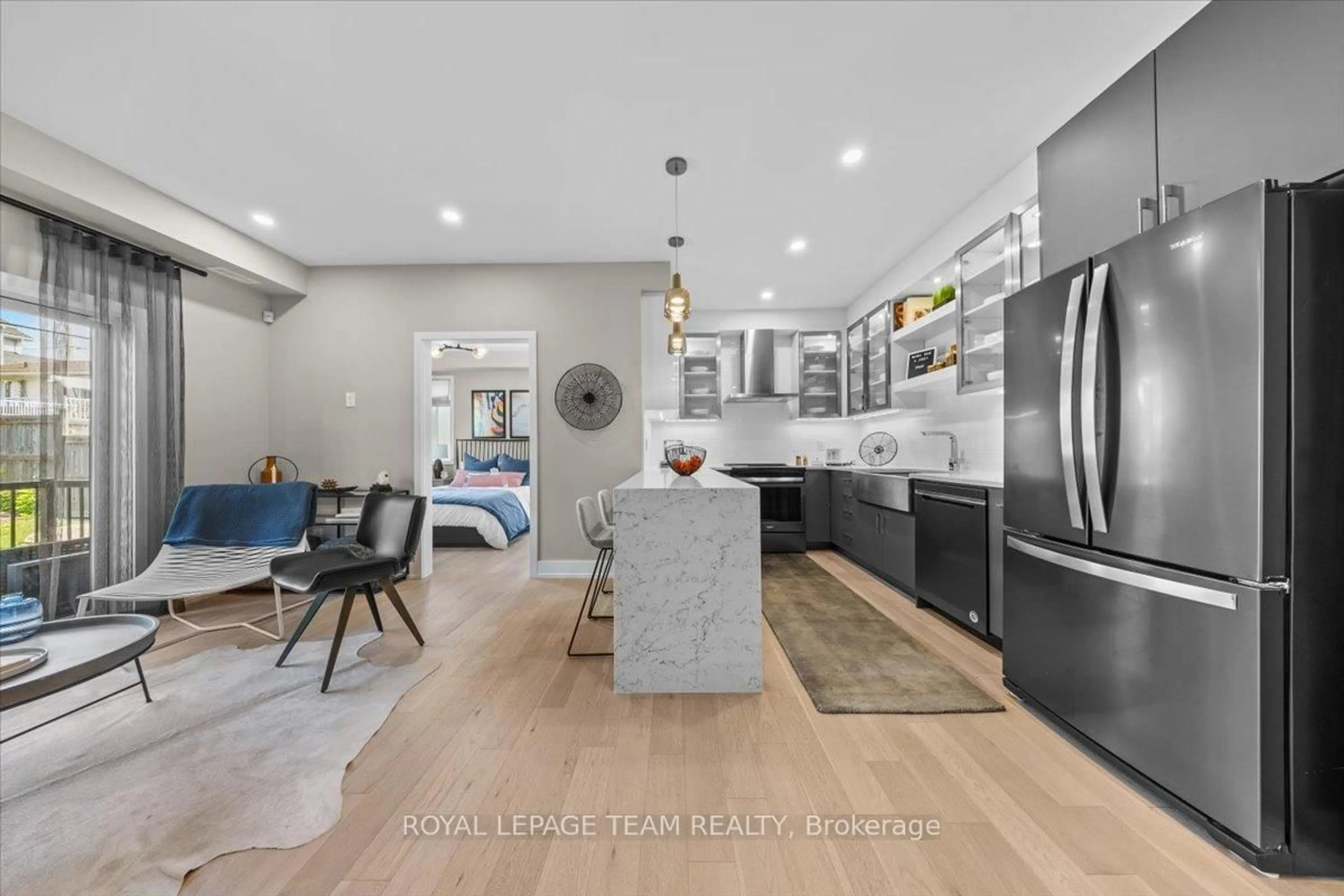 Open concept kitchen, ceramic/tile floor for 2376 Tenth Line Rd #202, Orleans Ontario K4A 5T9