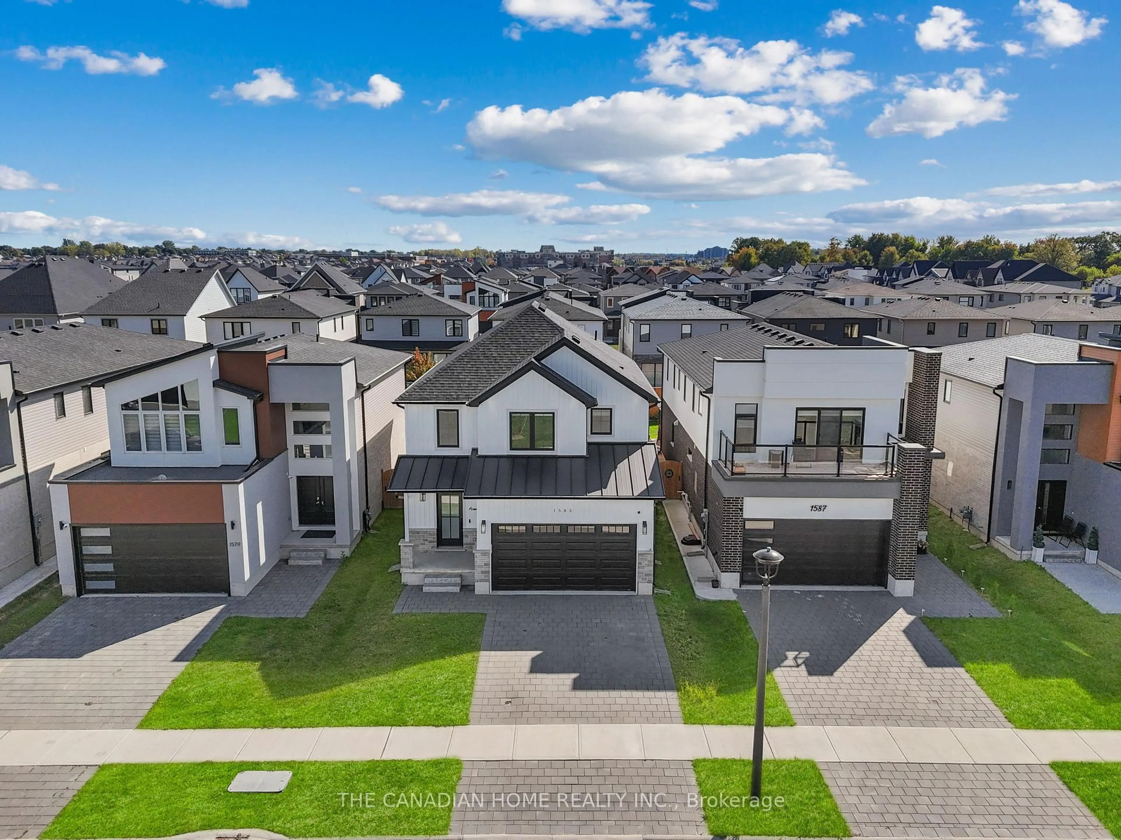 A pic from outside/outdoor area/front of a property/back of a property/a pic from drone, street for 1583 BOB SCHRAM Way, London North Ontario N6G 3K2