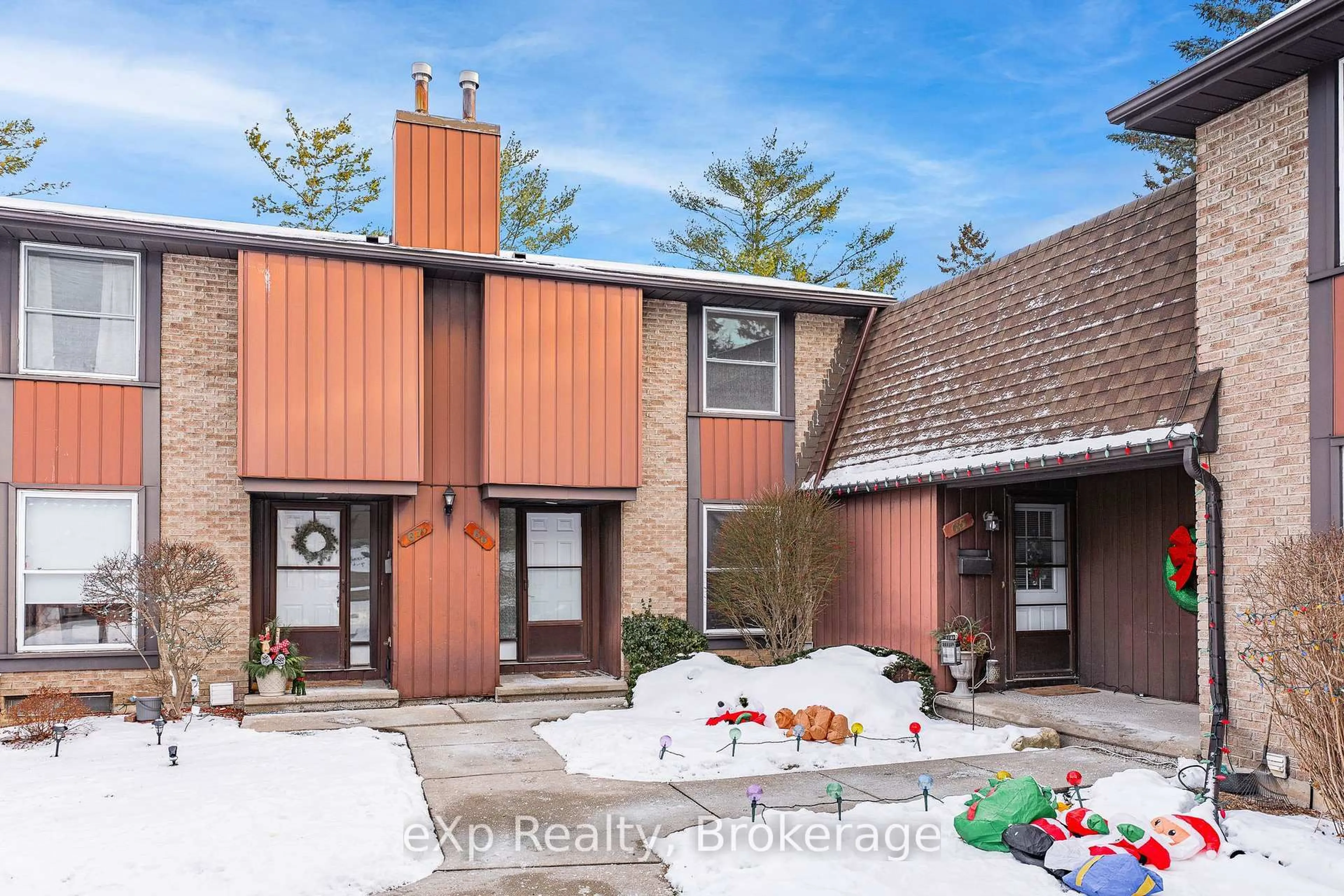 A pic from outside/outdoor area/front of a property/back of a property/a pic from drone, unknown for 539 Willow Rd #66, Guelph Ontario N1H 7G3