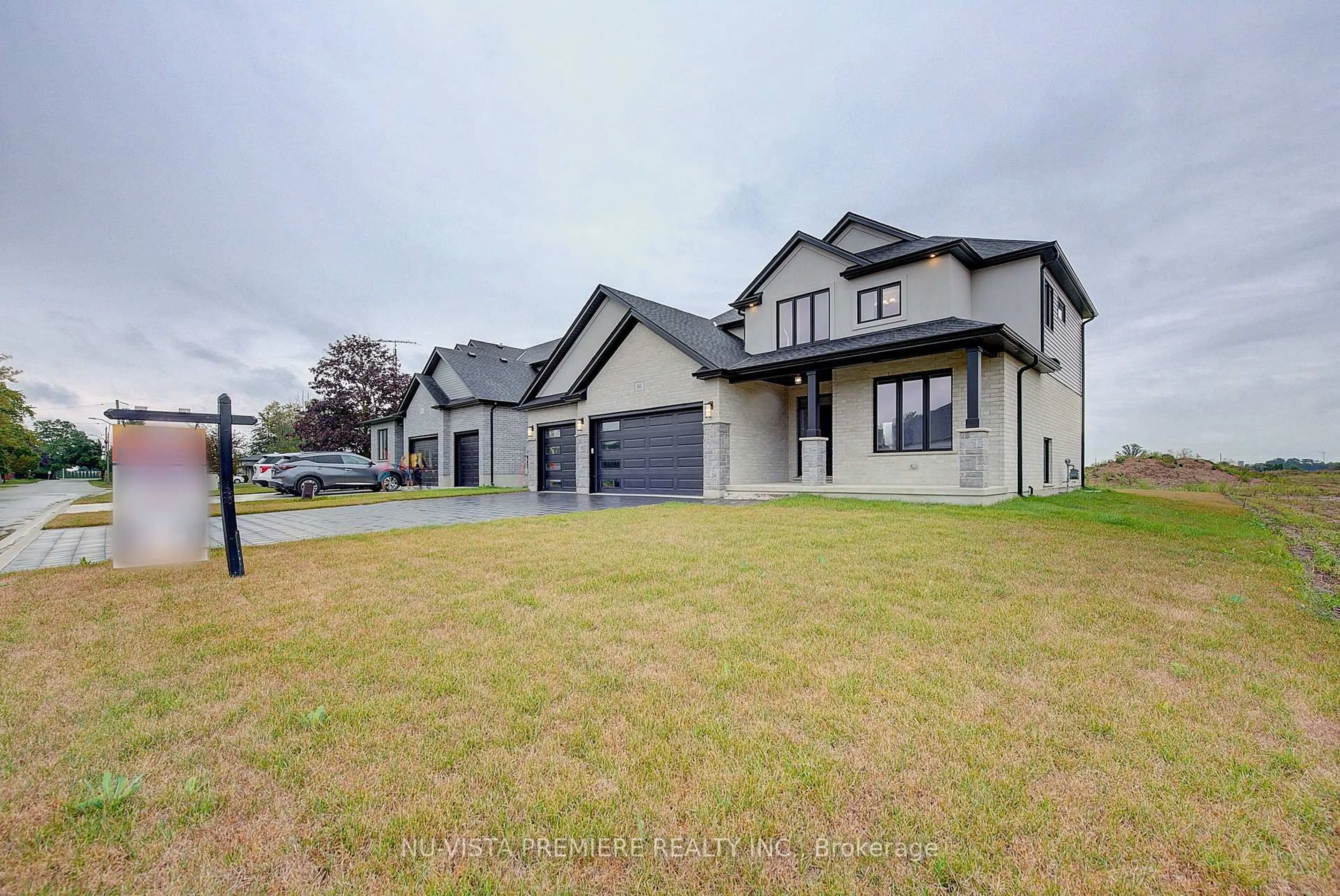 A pic from outside/outdoor area/front of a property/back of a property/a pic from drone, street for 161 Mcleod St, North Middlesex Ontario N0M 2K0