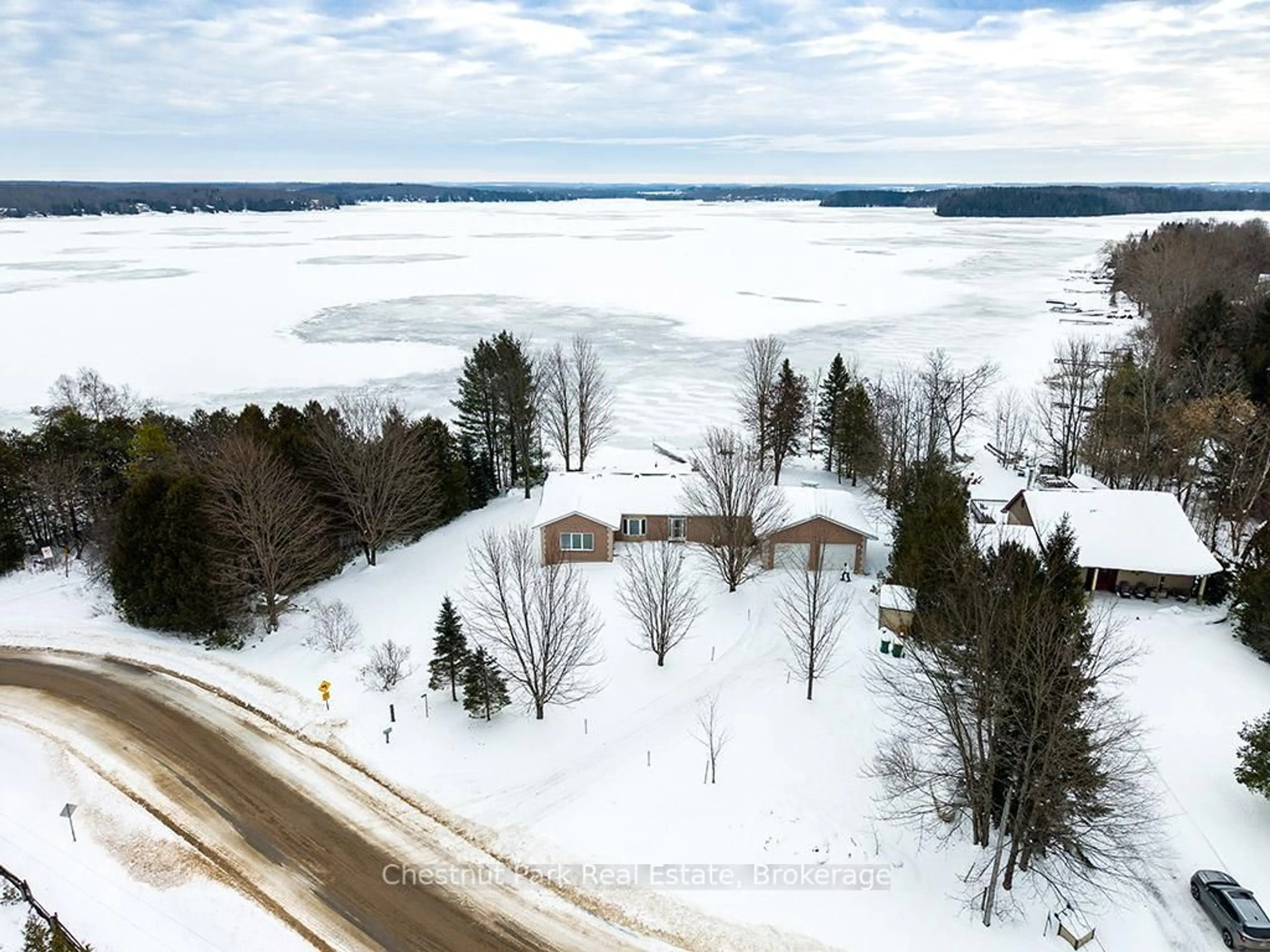 A pic from outside/outdoor area/front of a property/back of a property/a pic from drone, water/lake/river/ocean view for 189 Point Rd, Grey Highlands Ontario N0C 1E0