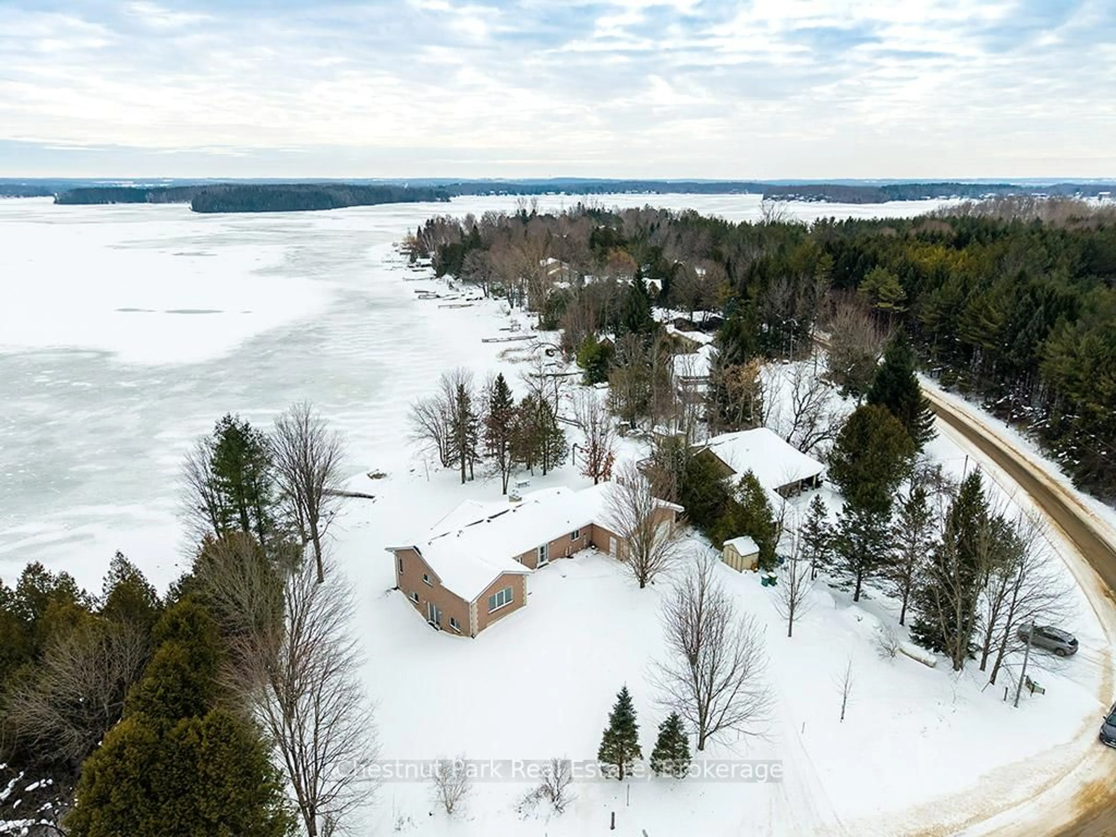 A pic from outside/outdoor area/front of a property/back of a property/a pic from drone, water/lake/river/ocean view for 189 Point Rd, Grey Highlands Ontario N0C 1E0