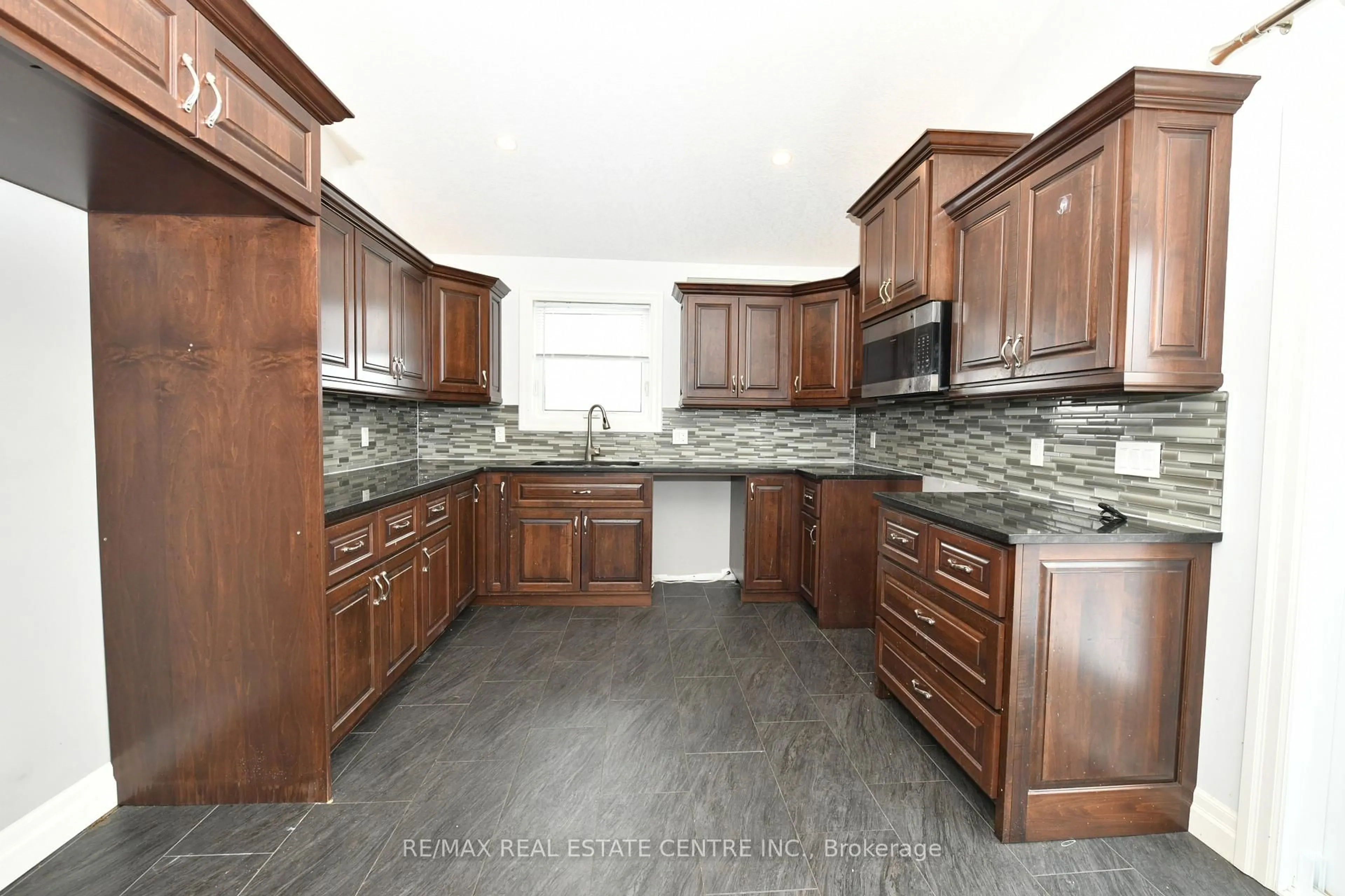 Standard kitchen, ceramic/tile floor for 13 FORBES Cres, North Perth Ontario N4W 0B3