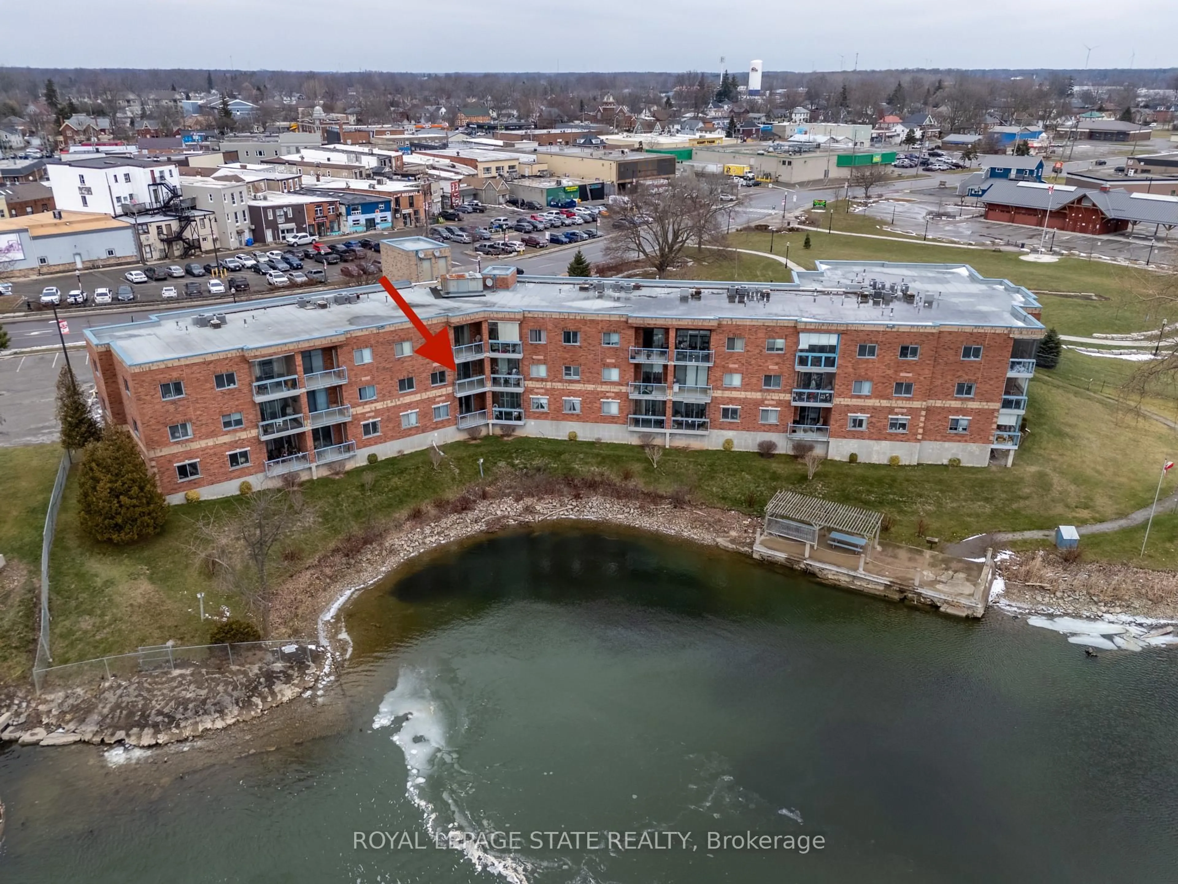 A pic from outside/outdoor area/front of a property/back of a property/a pic from drone, water/lake/river/ocean view for 210 Main St #203, Haldimand Ontario N1A 3G7