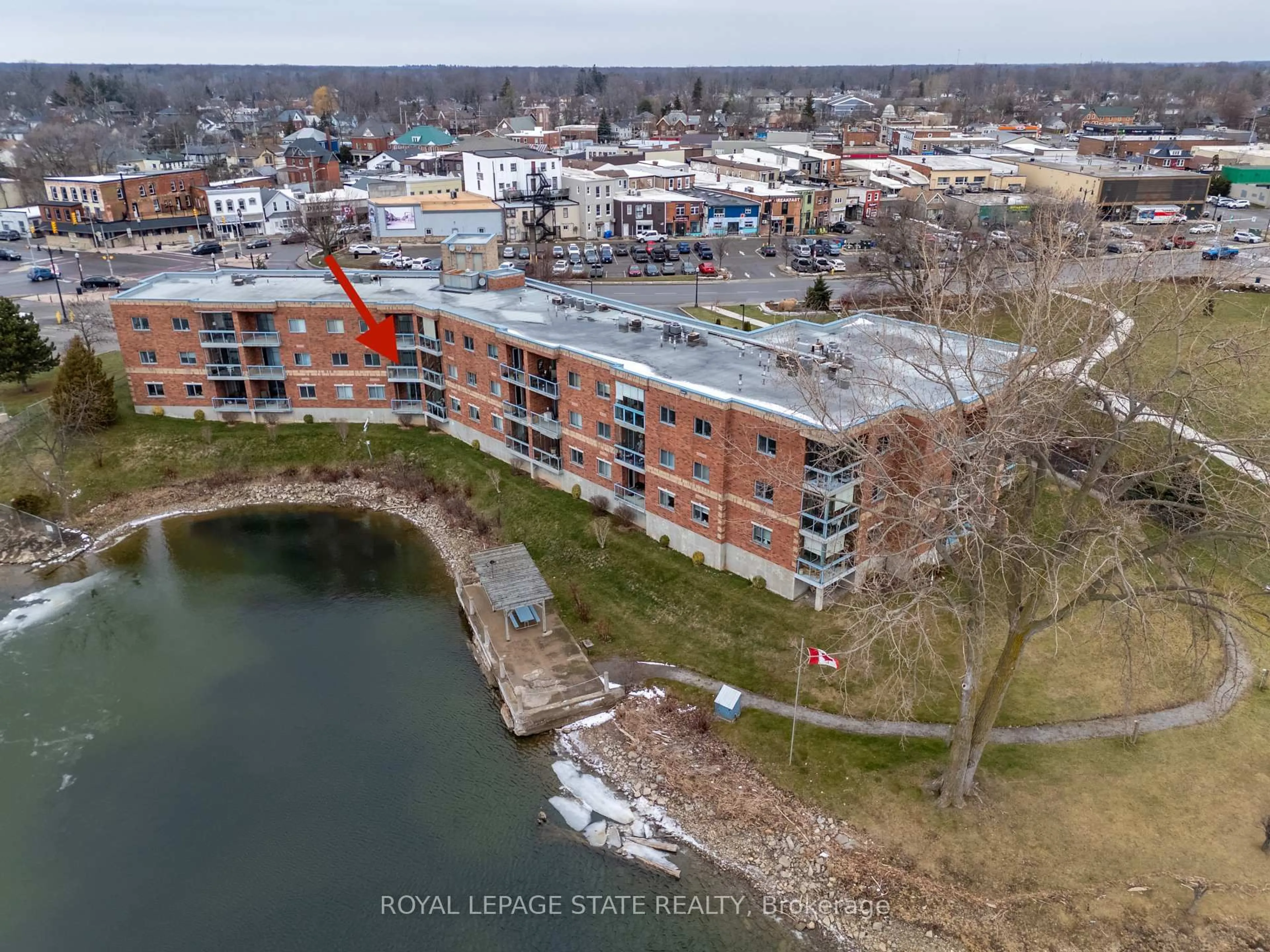 A pic from outside/outdoor area/front of a property/back of a property/a pic from drone, water/lake/river/ocean view for 210 Main St #203, Haldimand Ontario N1A 3G7