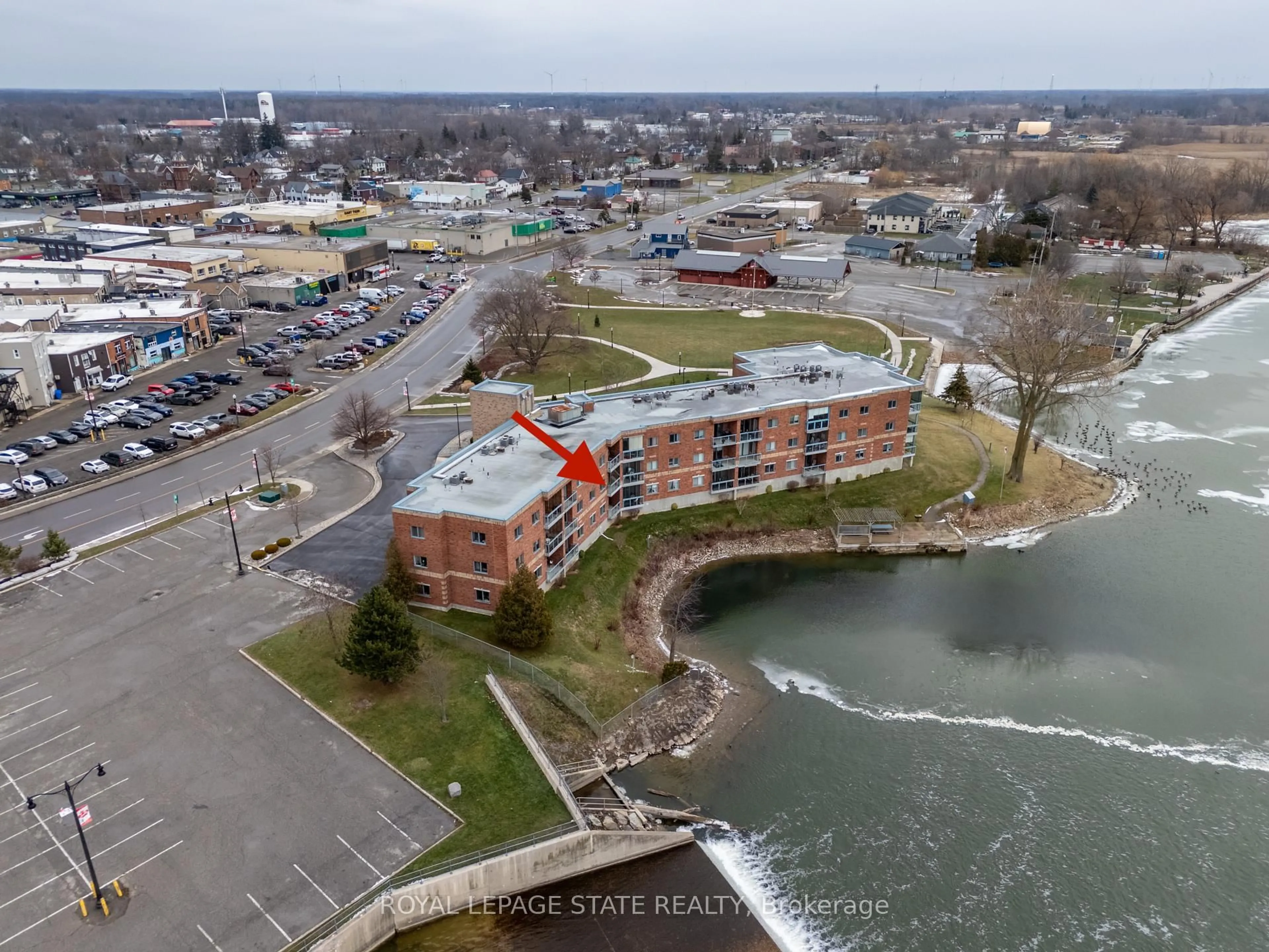 A pic from outside/outdoor area/front of a property/back of a property/a pic from drone, water/lake/river/ocean view for 210 Main St #203, Haldimand Ontario N1A 3G7