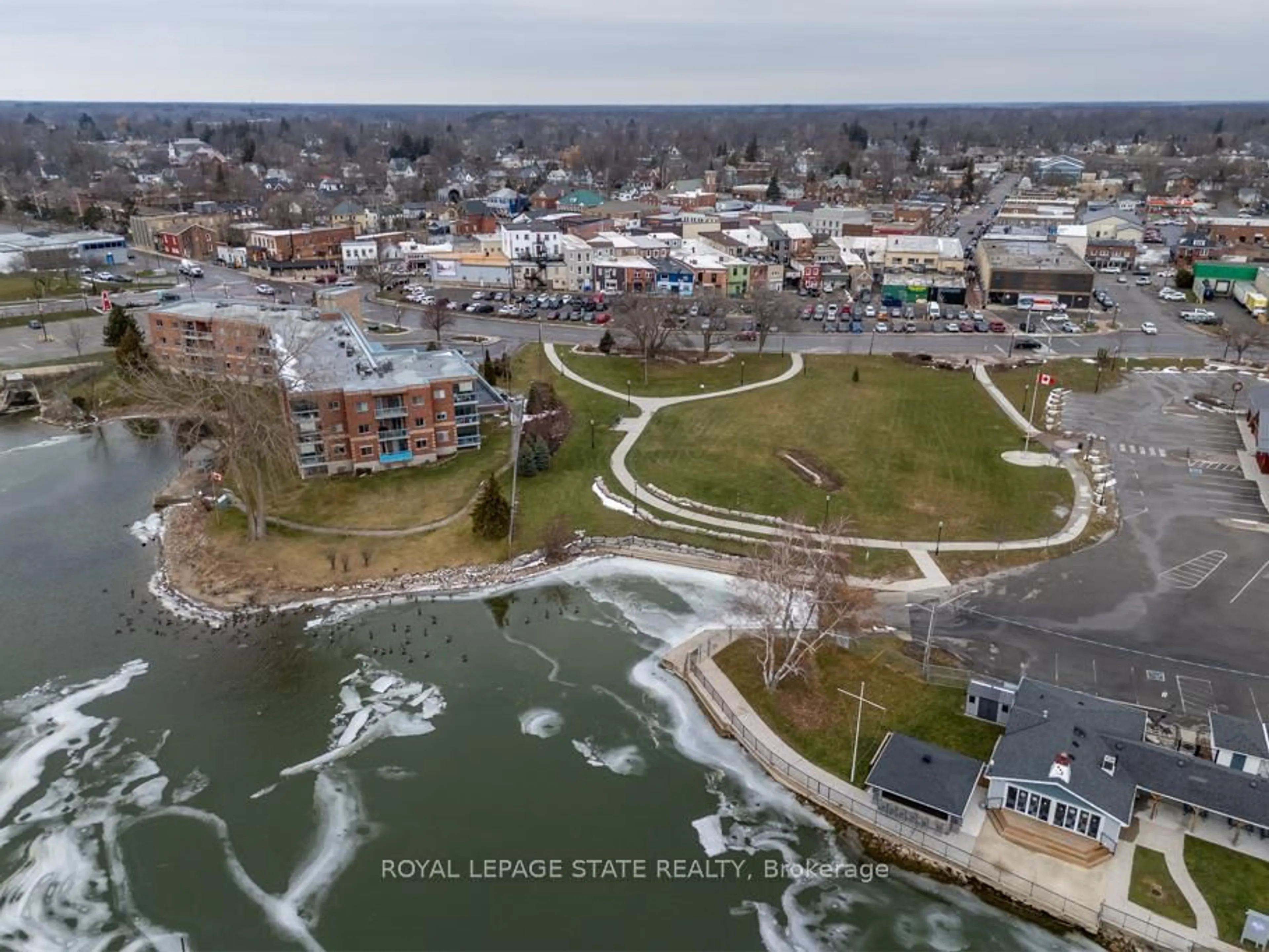 A pic from outside/outdoor area/front of a property/back of a property/a pic from drone, water/lake/river/ocean view for 210 Main St #203, Haldimand Ontario N1A 3G7