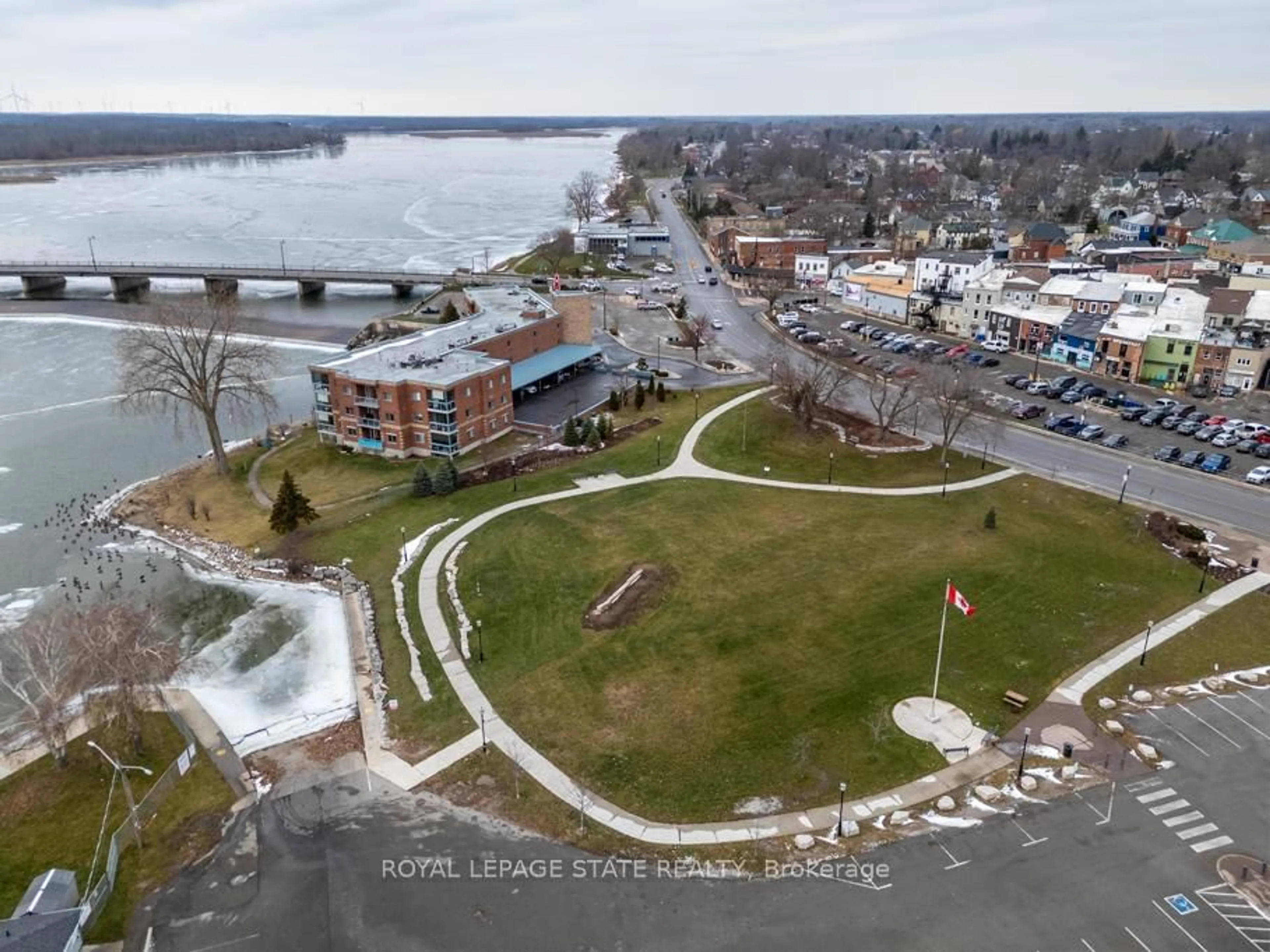 A pic from outside/outdoor area/front of a property/back of a property/a pic from drone, water/lake/river/ocean view for 210 Main St #203, Haldimand Ontario N1A 3G7