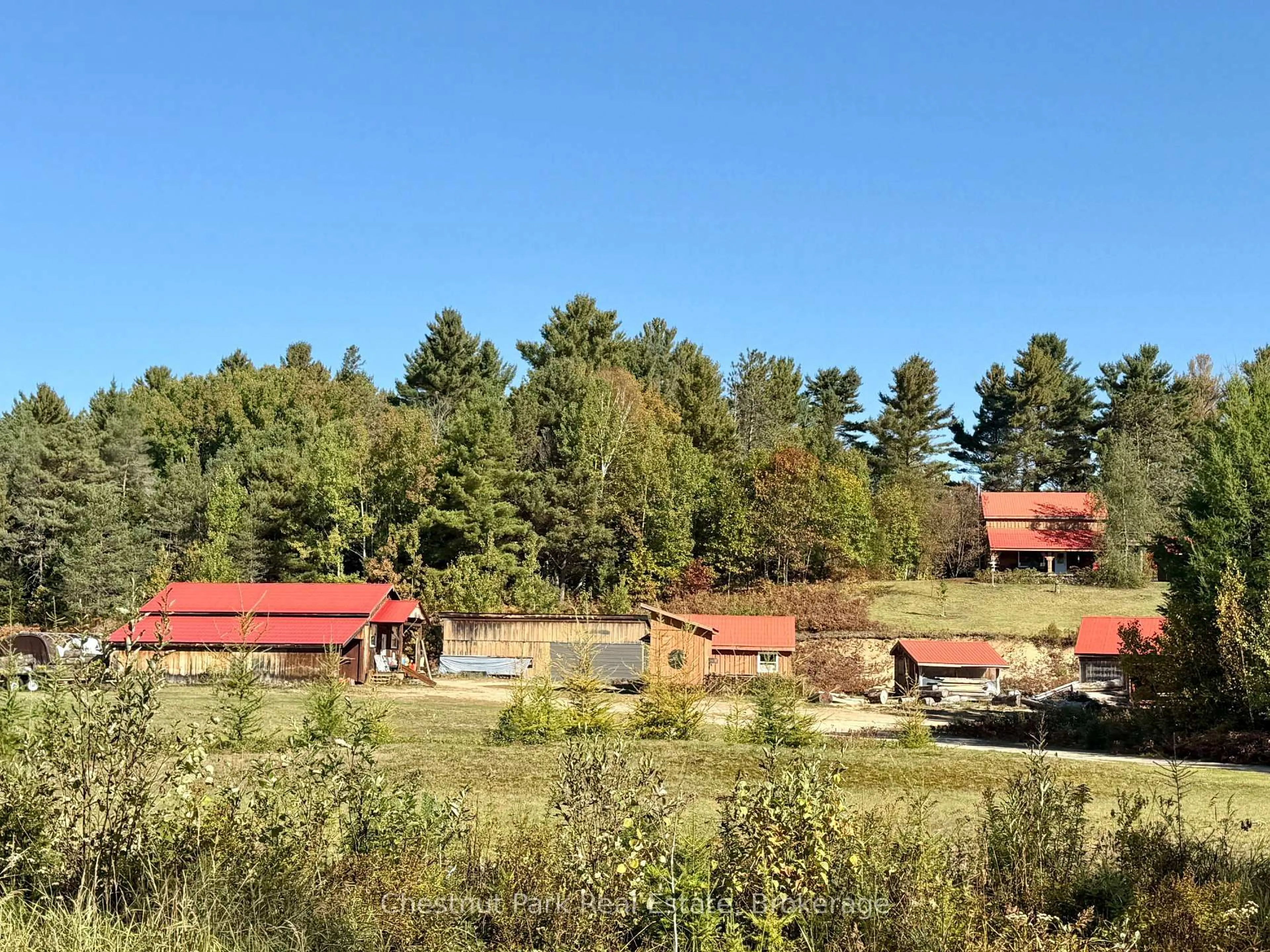 A pic from outside/outdoor area/front of a property/back of a property/a pic from drone, unknown for 4641 518 E Highway, Kearney Ontario P0A 1M0