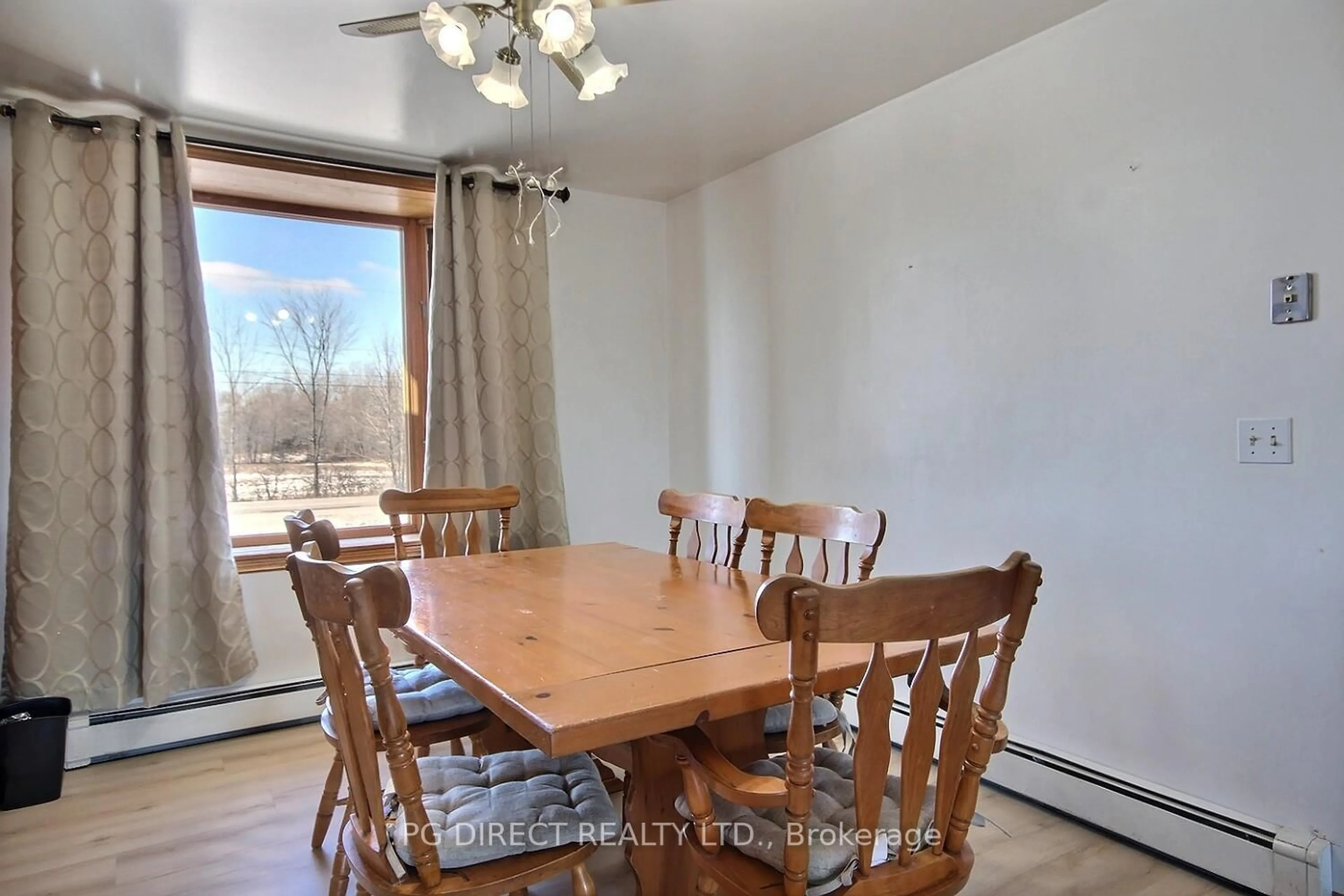 Dining room, wood/laminate floor for 3460 Shannonville Rd, Belleville Ontario K0K 2Y0