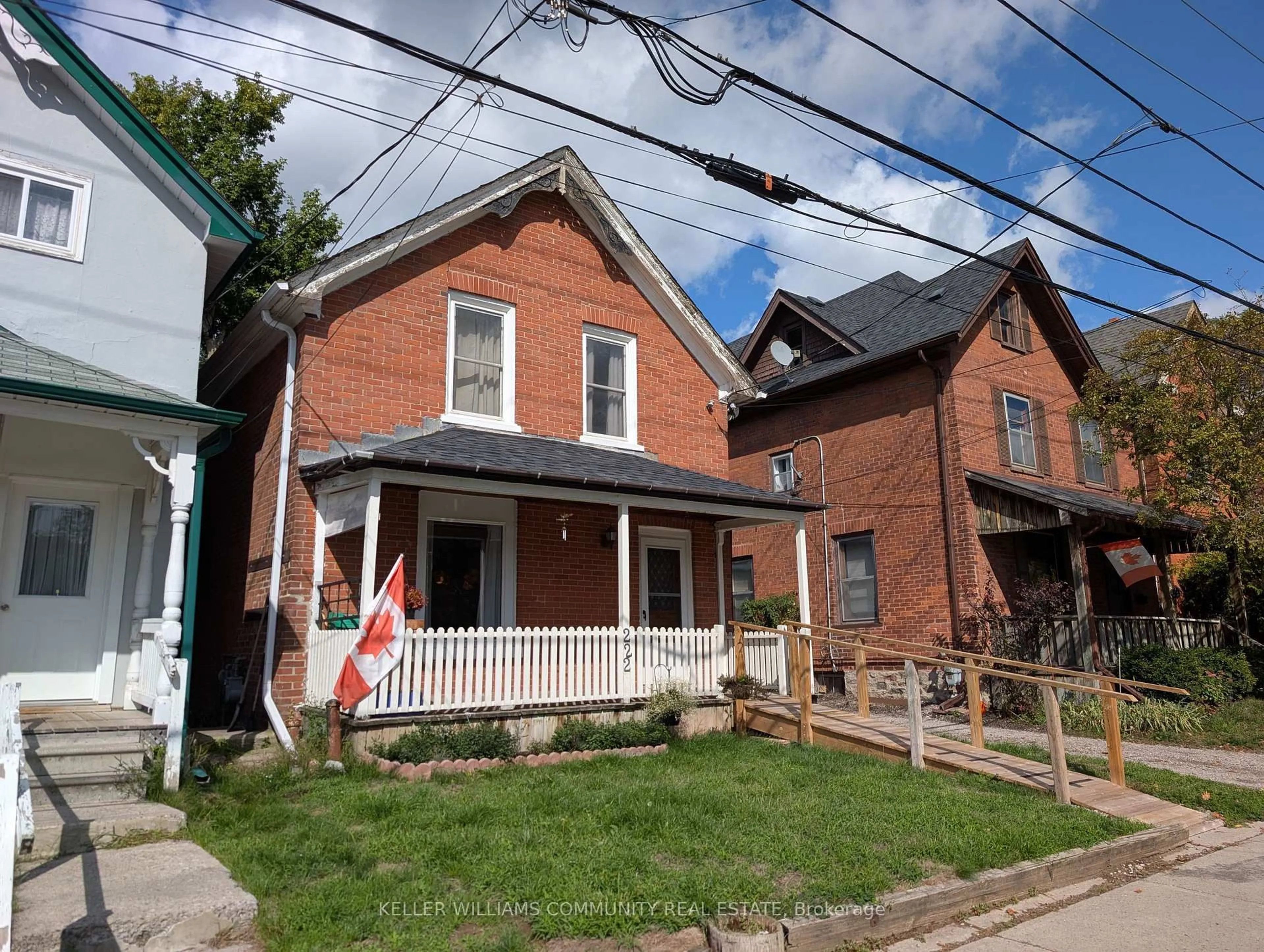 Home with brick exterior material, street for 222 London St, Peterborough Ontario K9H 2Y9