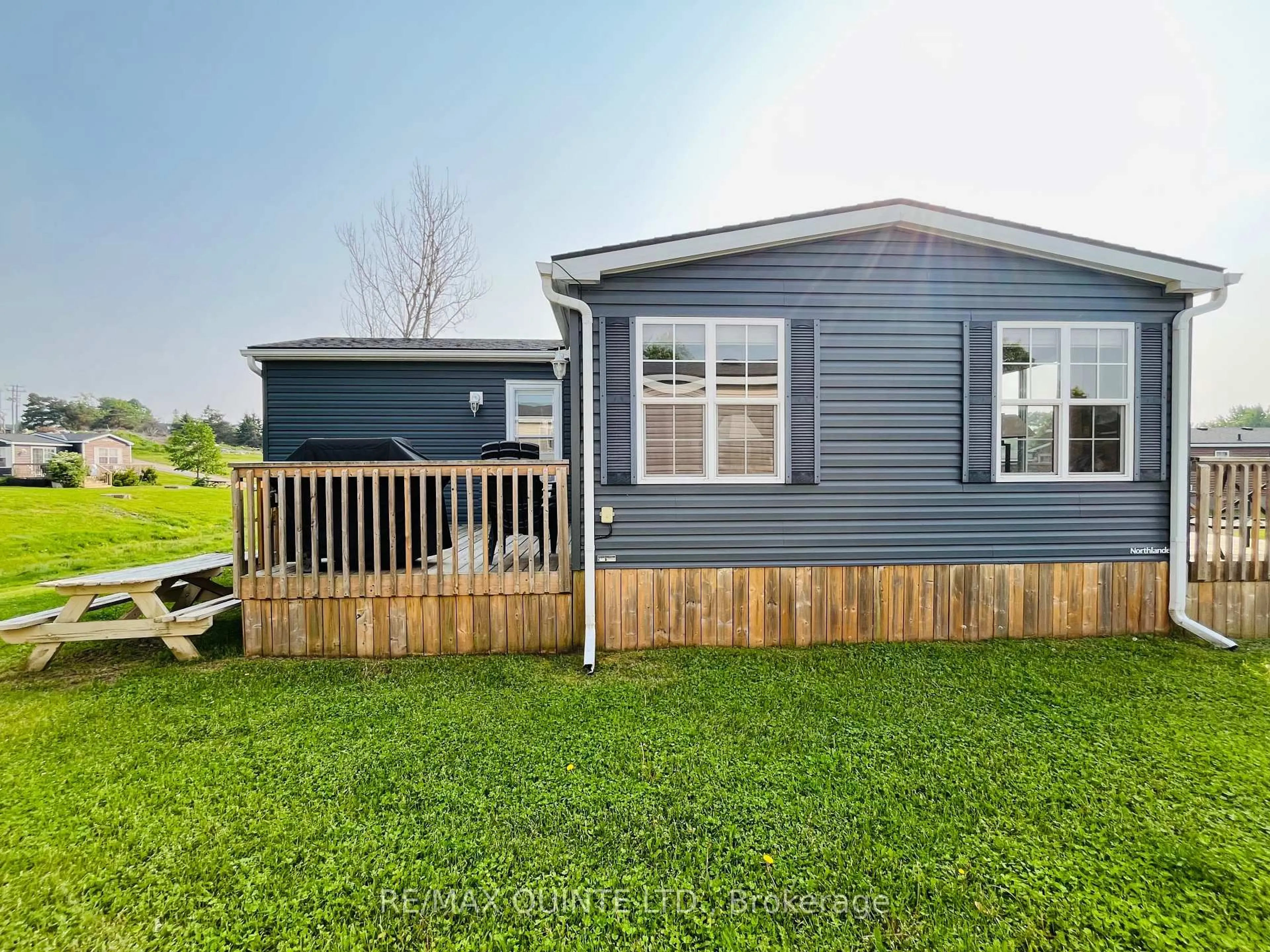 Home with vinyl exterior material, water/lake/river/ocean view for 486 County Road 18 #8 Cricket Ln, Prince Edward County Ontario K0K 1P0