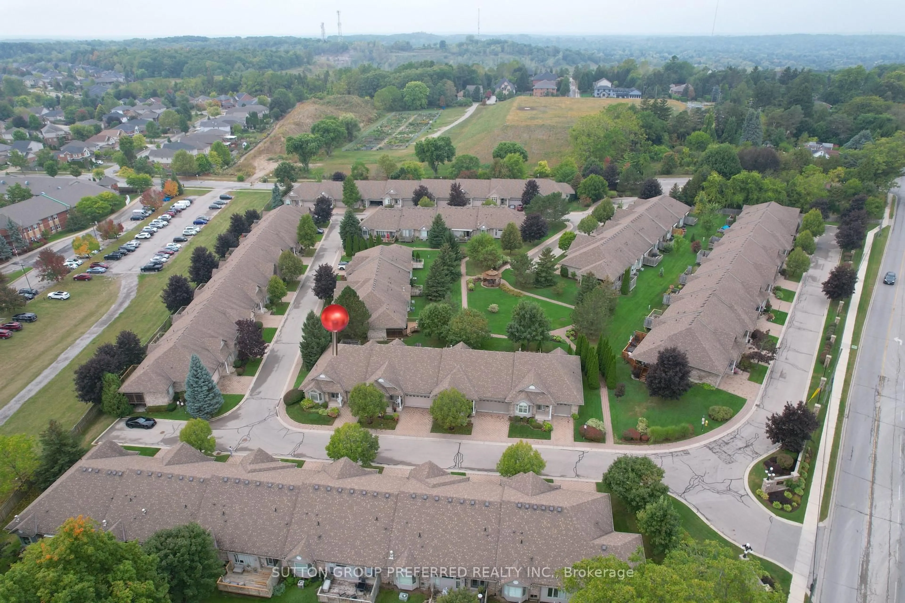A pic from outside/outdoor area/front of a property/back of a property/a pic from drone, street for 800 Commissioners Rd #12, London South Ontario N6K 1C2