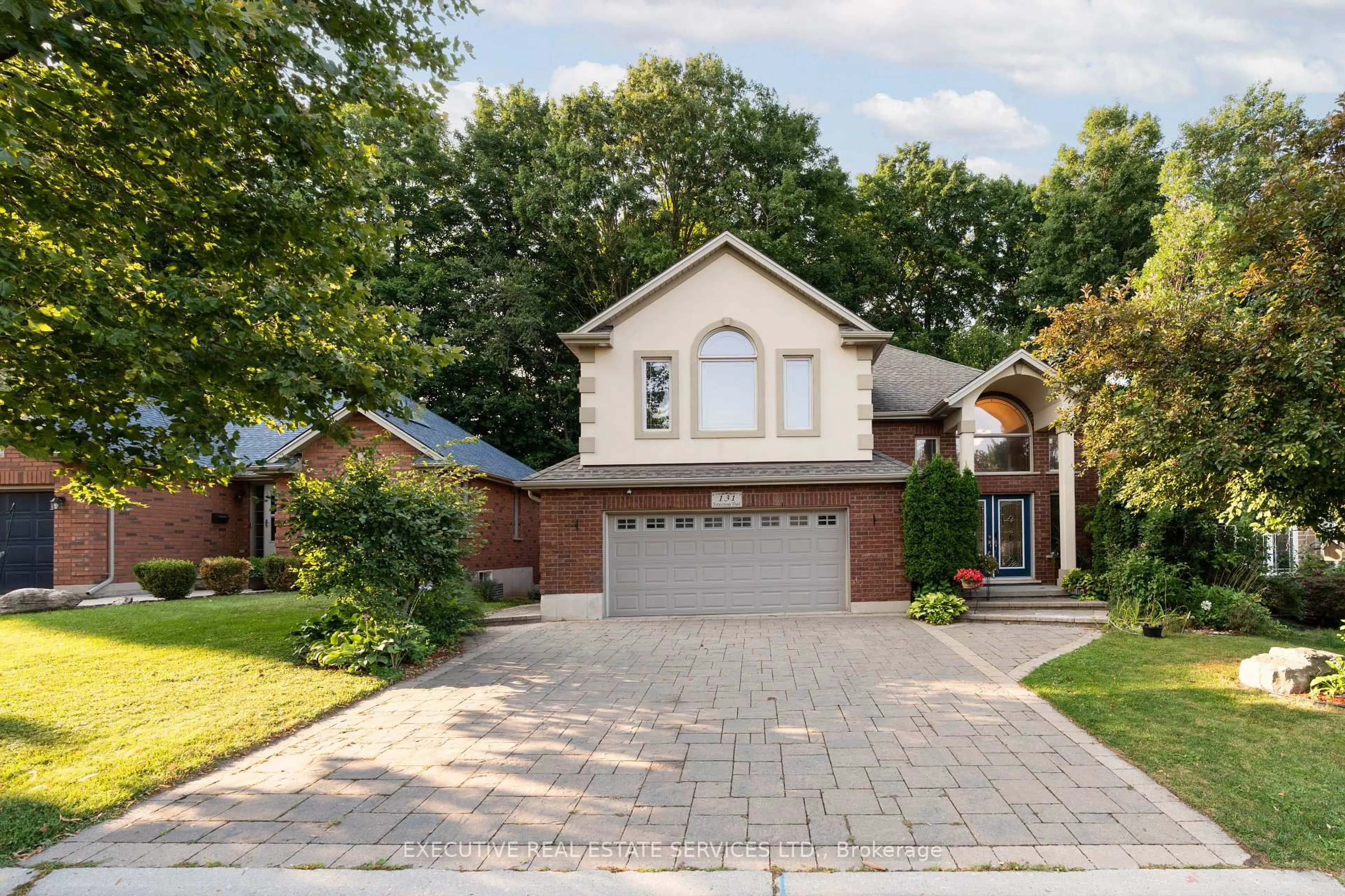 Home with brick exterior material, street for 131 Forestway Tr, Woodstock Ontario N4S 9A7