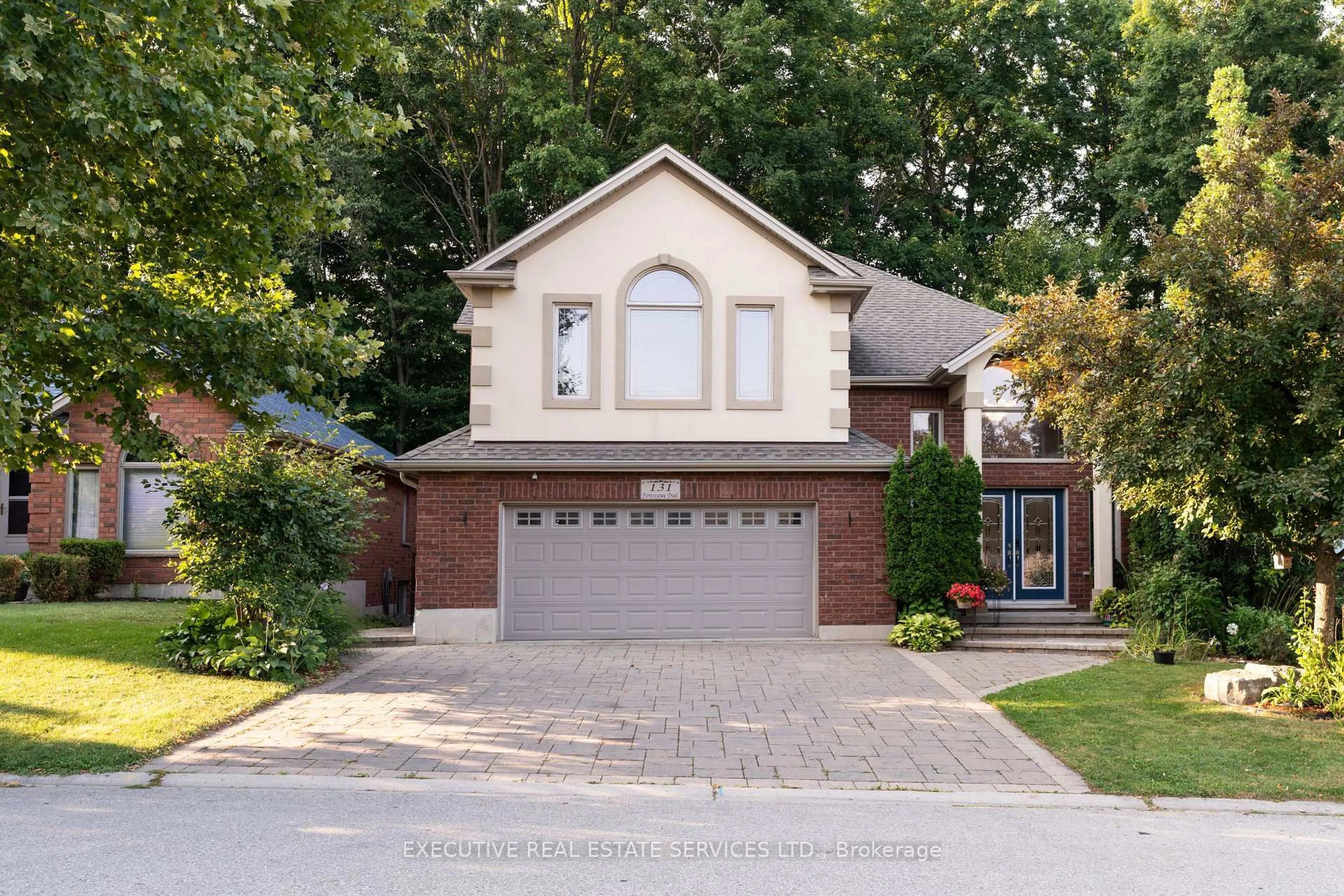 Home with brick exterior material, street for 131 Forestway Tr, Woodstock Ontario N4S 9A7